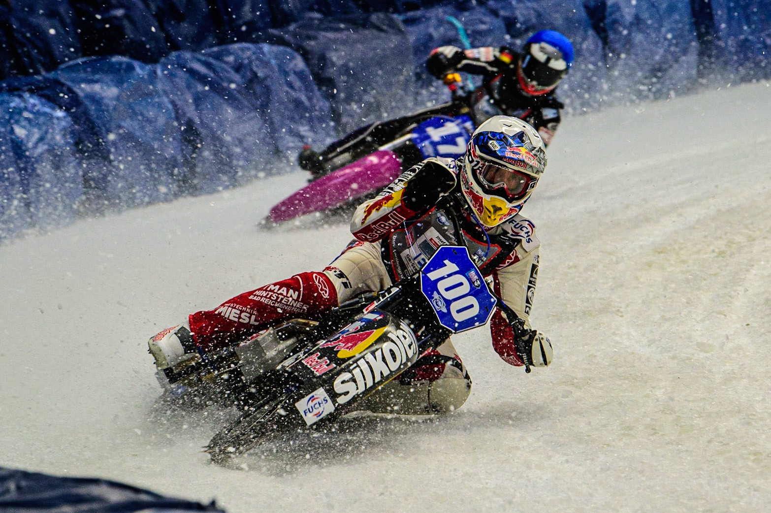 Franz Zorn (100) (White)  leads Benedikt Monn (17) (Blue)during the Ice Speedway Gladiators World Championship Final 2 at Max-Aicher-Arena, Inzell, Germany on Sunday 19th March 2023. (Photo: Ian Charles | MI News)