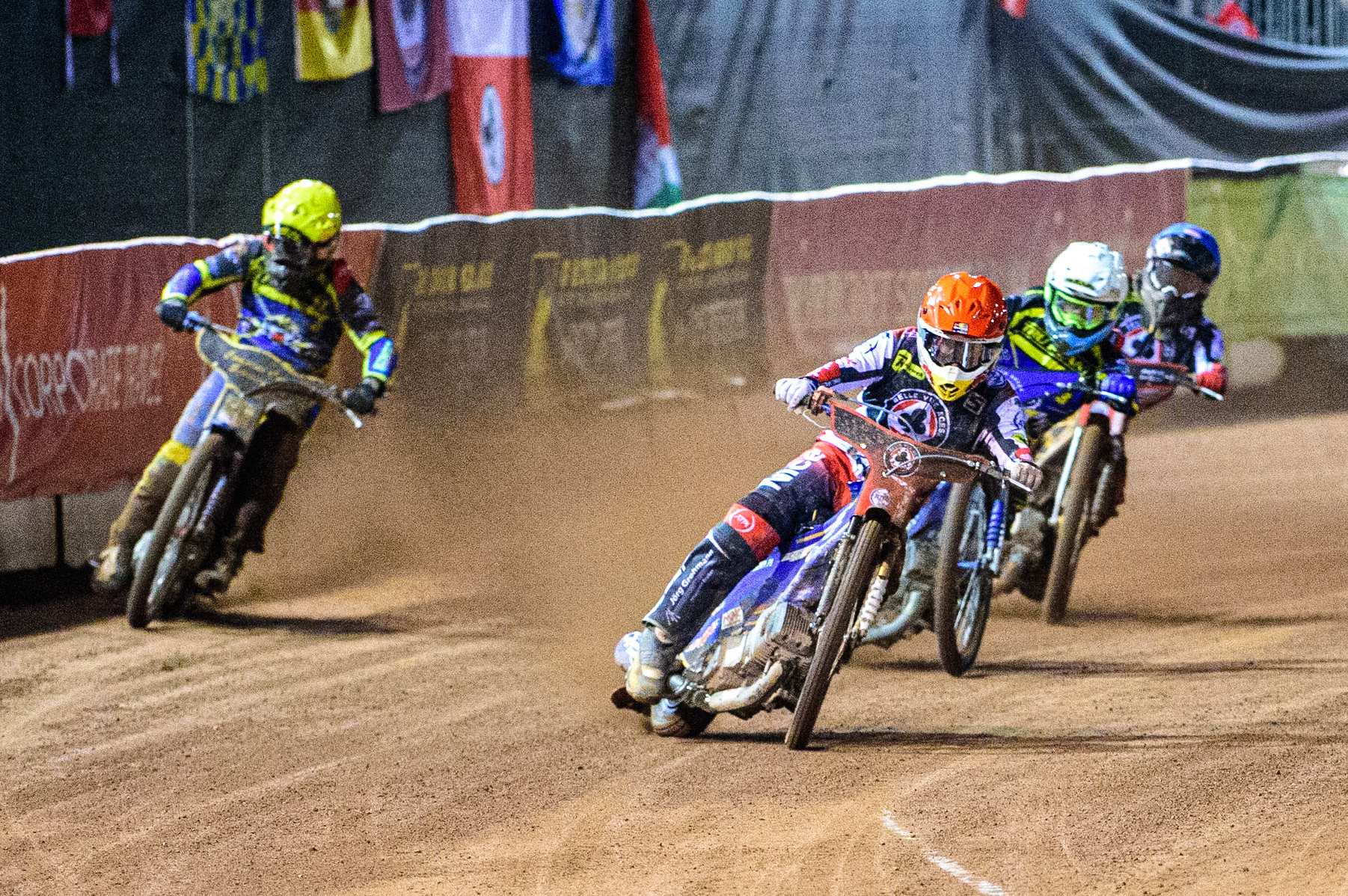 Robert Lambert  (Red) leads Adam Ellis  (White) Kyle Howarth  (Yellow) and Norick Blödorn  (Blue) during the SGB Premiership Grand Final 1st leg between Belle Vue Aces and Sheffield Tigers at the National Speedway Stadium, Manchester on Monday 10th October 2022. (Credit: Ian Charles | MI News)