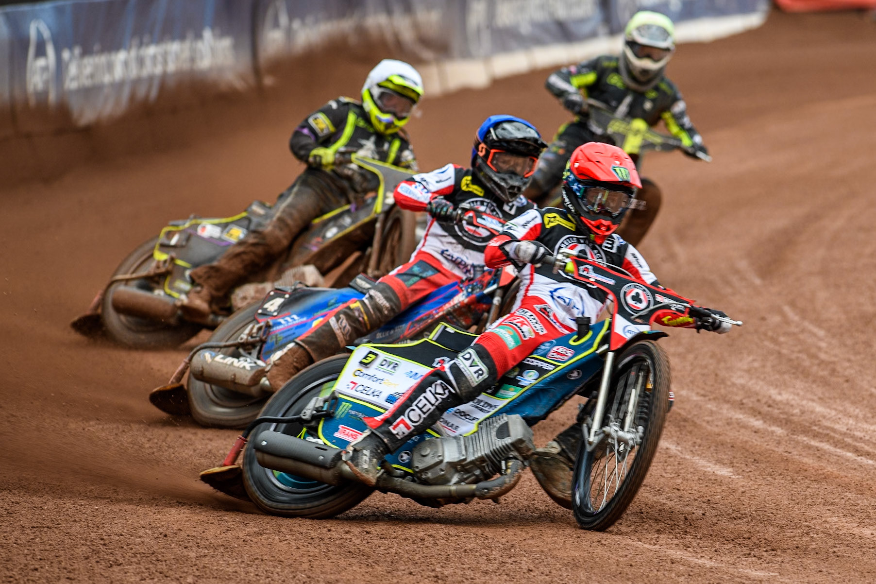 Belle Vue Aces' Jaimon Lidsey  in Red leading Belle Vue Aces' Ben Cook  in Blue, Ipswich Witches' Guest Rider Tom Brennan  in White and Ipswich Witches' Dan Thompson in Yellow during the Rowe Motor Oil Premiership match between Belle Vue Aces and Ipswich Witches at the National Speedway Stadium, Manchester on Monday 1st July 2024. (Photo: Ian Charles | MI News)