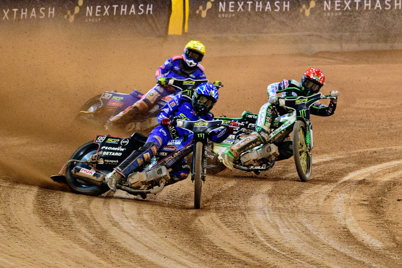 The Grand Final: Dan Bewley (99) (Blue) leads Patryk Dudek (692) (Red) and Leon Madsen (30) (Yellow) during the FIM  Speedway Grand Prix of Great Britain at the Principality Stadium, Cardiff on Saturday 13th August 2022. (Credit: Ian Charles | MI News