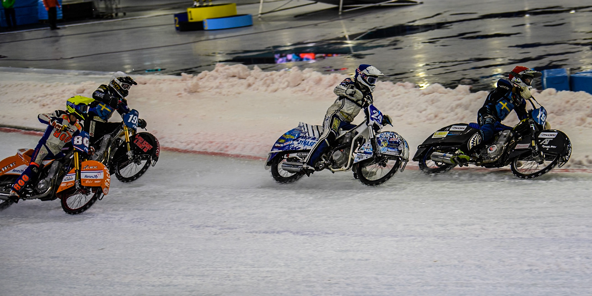 The Grand Final, as Niclas Svensson (192) of Sweden in Red leading Max Koivula (24) of Finland in Blue, Martin Haarahiltunen (199) of Sweden in White and Jasper Iwema (800) of The Netherlands in Yellow into the first turn during the FIM Ice Speedway Gladiators World Championship, Final 4 at the Ice Stadium, Thialf, Heerenveen on Sunday 6th April 2025. (Photo: Ian Charles | MI News)