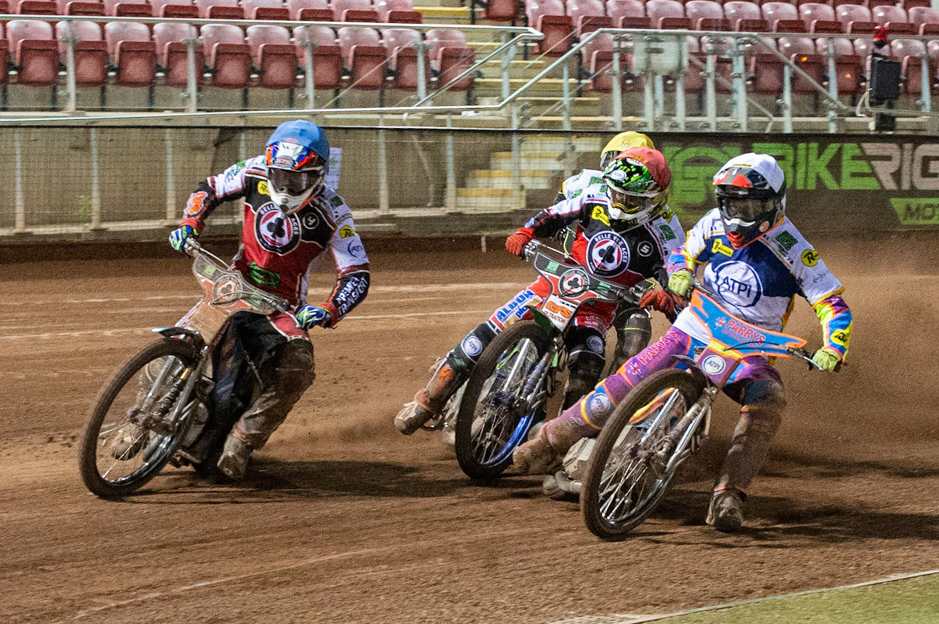 Photo: Ian CharlesRory Schlein of the 'ATPI' All Stars (White) inside Steve Worrall of Belle Vue 'BikeRight' Aces  (Blue) and Dan Bewley of Belle Vue 'BikeRight' Aces  (Red) Belle Vue ‘Bikerite ’Aces v ‘ATPI’ All Stars, Premiership Challenge, National Speedway Stadium, Manchester Thursday  24  September  2020