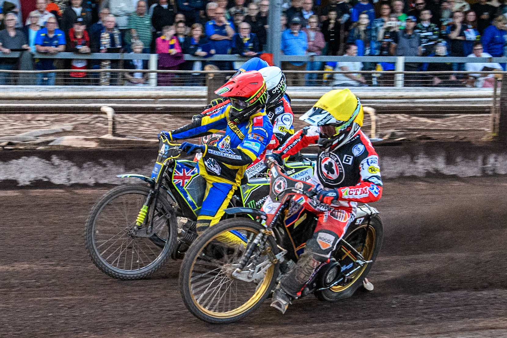 Belle Vue Aces' Connor Mountain  in Yellow rides inside Sheffield Tigers' Chris Holder  in Red, Belle Vue Aces' Jaimon Lidsey  in White and Sheffield Tigers' Dan Gilkes  in Yellow during the Premiership KO Cup Quarter Final, 2nd Leg match between Sheffield Tigers and Belle Vue Aces at Owlerton Stadium, Sheffield on Thursday 9th May 2024. (Photo: Ian Charles | MI News)