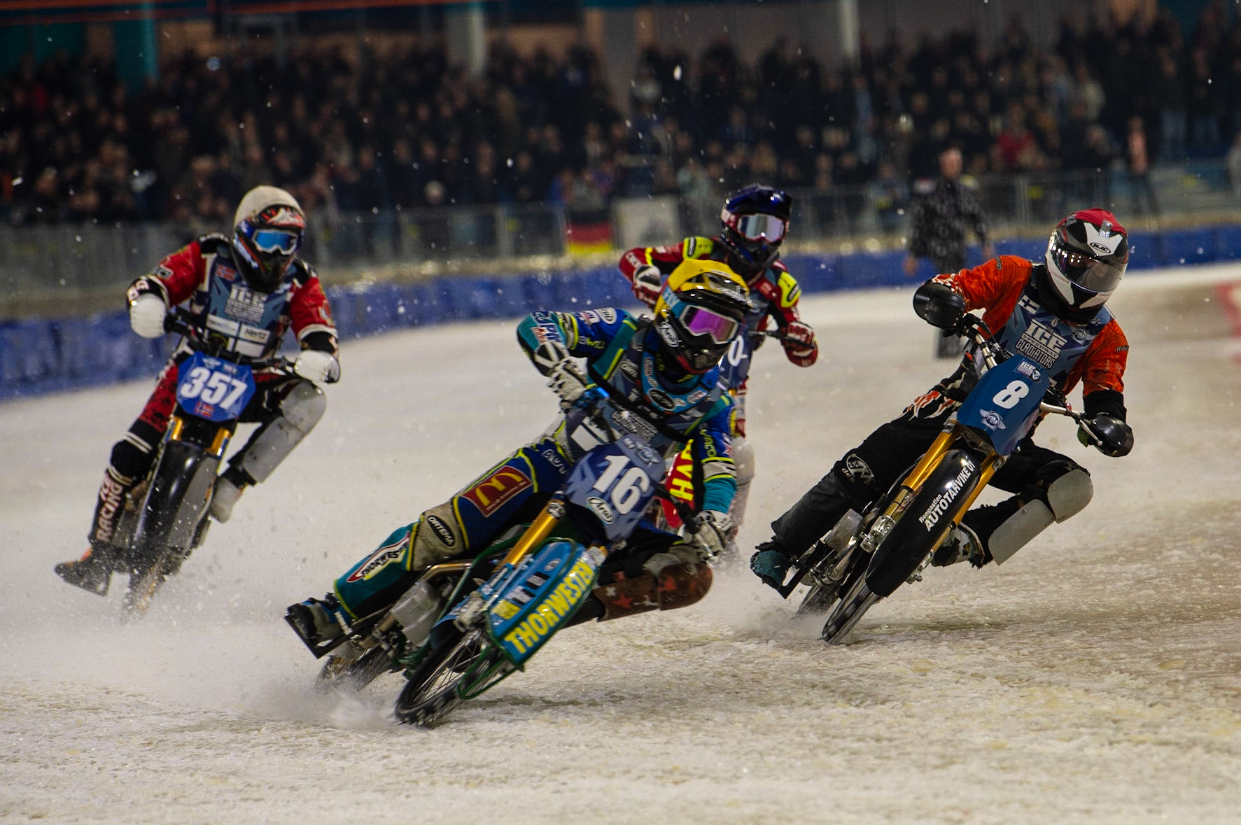 HEERENVEEN, NL. Luca Bauer (16) (Yellow) leads Aki Ala-Riihimäki (8) (Red) Jasper Iwema (800) (Blue) and Jo Sætre (357) (White) during the FIM Ice Speedway Gladiators World Championship Final 3 at Ice Rink Thialf, Heerenveen on Saturday  2 April 2022. (Credit: Ian Charles | MI News)