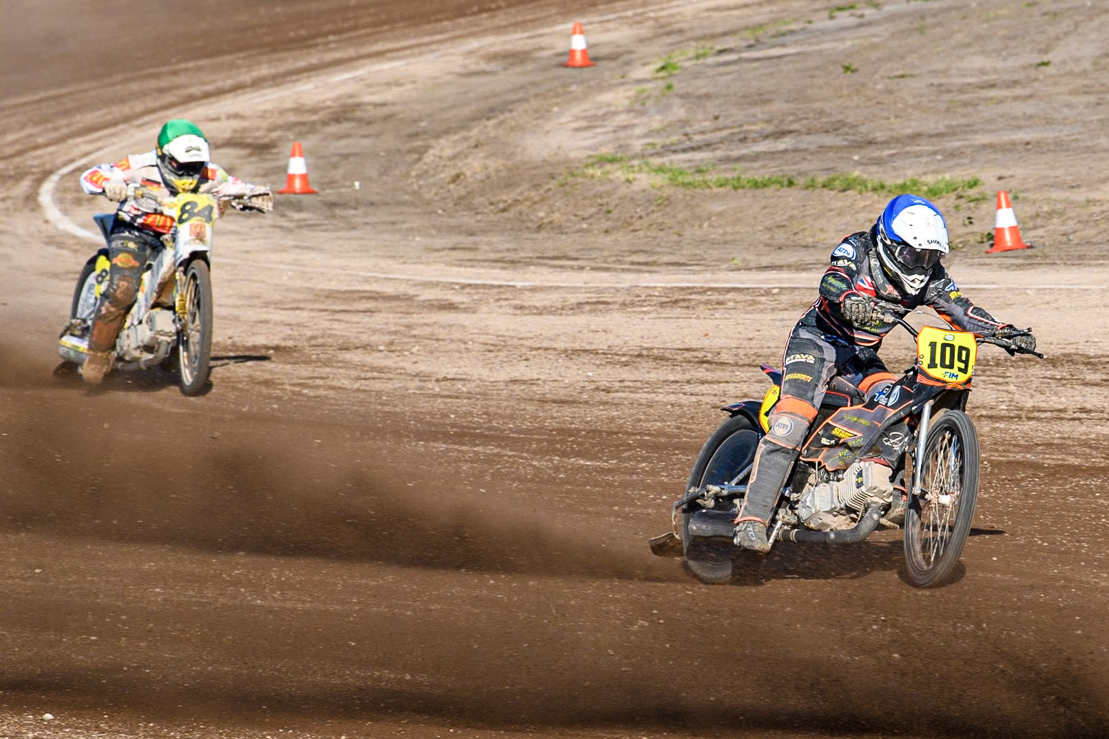 Zach Wajtknecht (109) of Great Britain in Blue leading Martin Smolinski (84) of Germany in Green  during the FIM Long Track World Championship Final 5 at the Speed Centre Roden, Roden, Netherlands on Sunday 22nd September 2024. (Photo: Ian Charles | MI News)