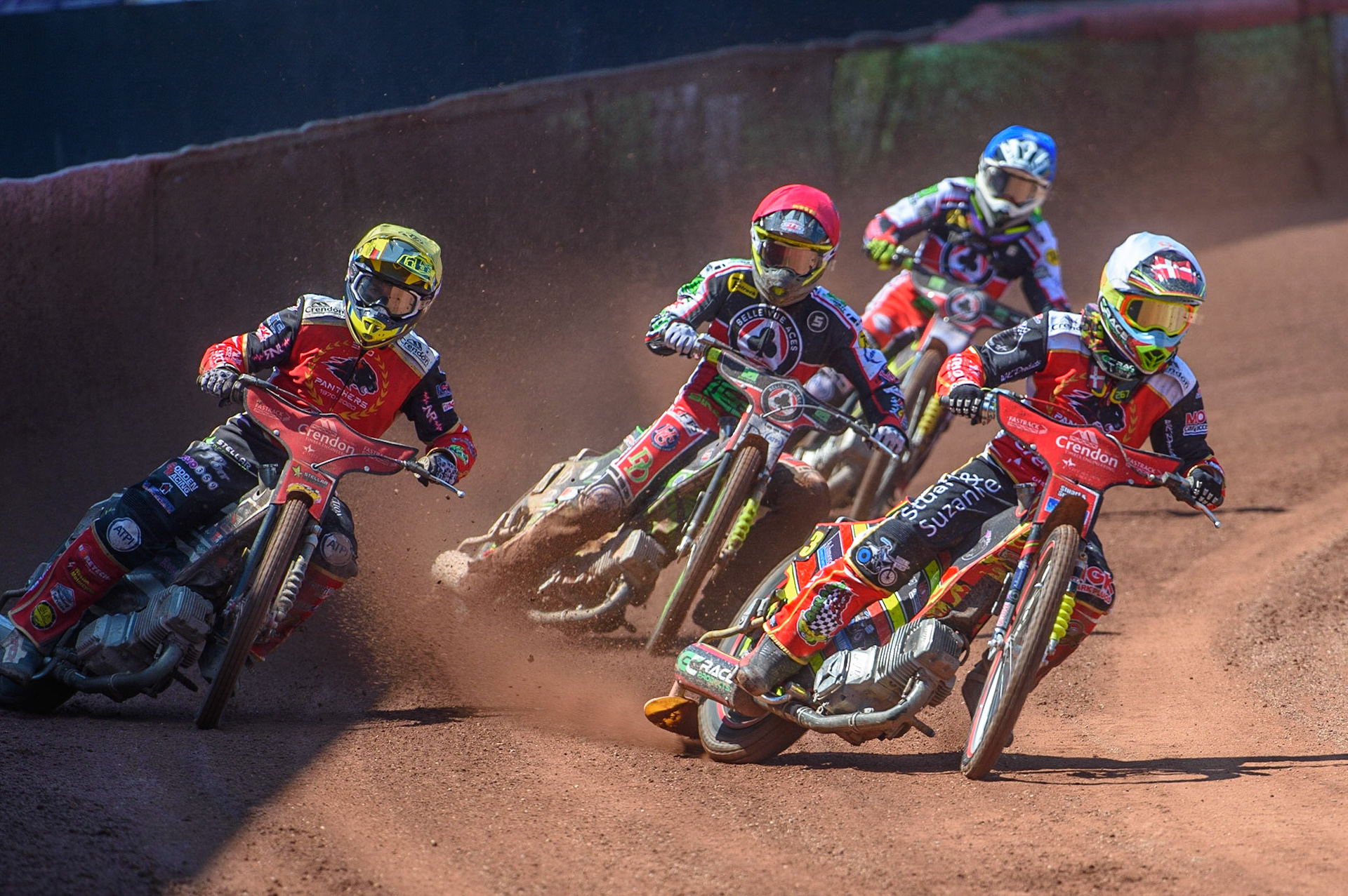 MANCHESTER, UK. MAY 31ST  Michael Palm Toft  (White) and Scott Nicholls  (Yellow) lead Charles Wright  (Red) and Tom Brennan  (Blue) during the SGB Premiership match between Belle Vue Aces and Peterborough at the National Speedway Stadium, Manchester on Monday 31st May 2021. (Credit: Ian Charles | MI News)