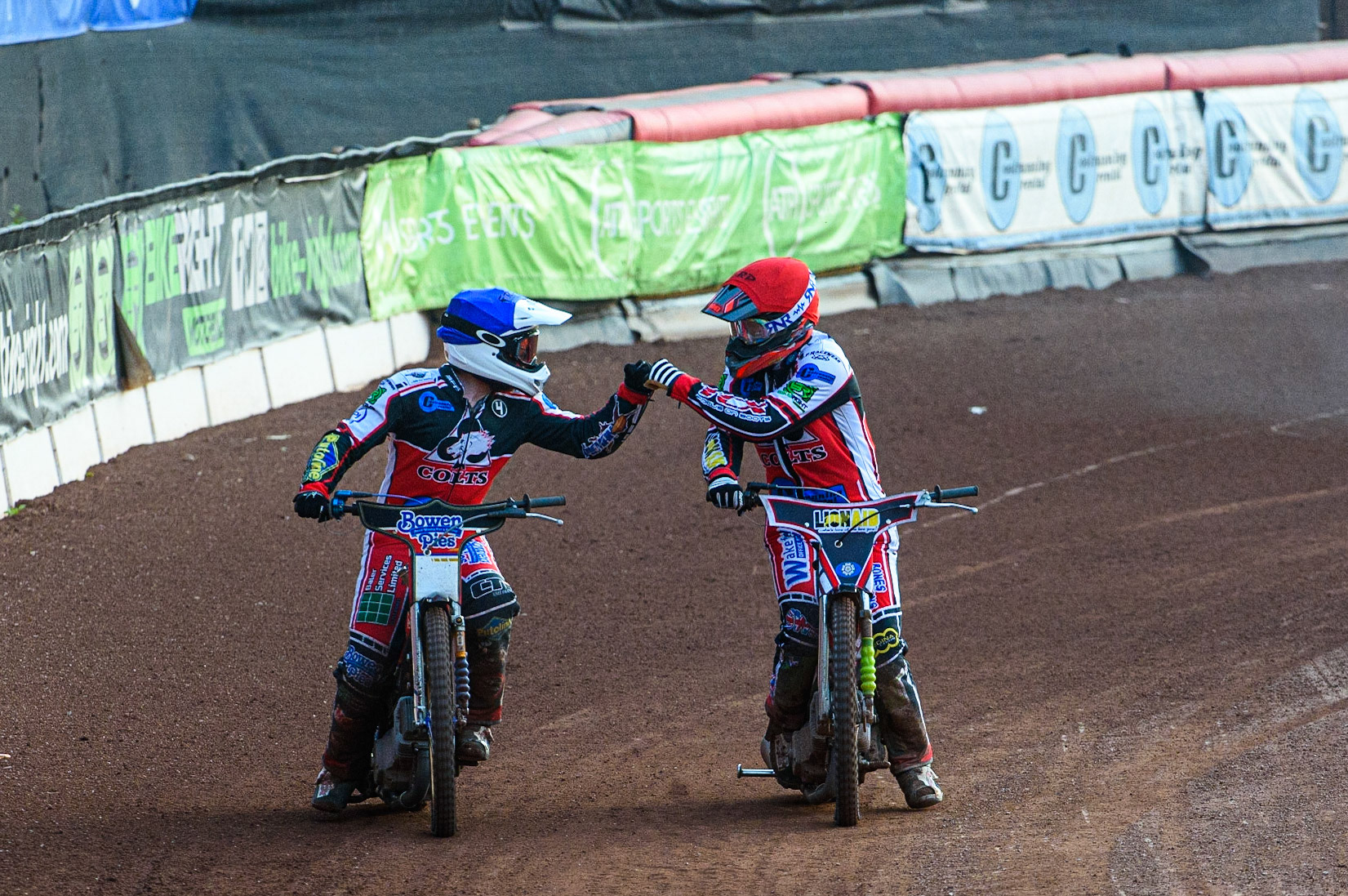 MANCHESTER, UK. JULY 23RD  Paul Bowen  (Blue) and Jack Parkinson-Blackburn  (Red) celebrate their second maximum points heat win during the National Development League match between Belle Vue Colts and Eastbourne Seagulls at the National Speedway Stadium, Manchester on Friday 23rd July 2021. (Credit: Ian Charles | MI News)