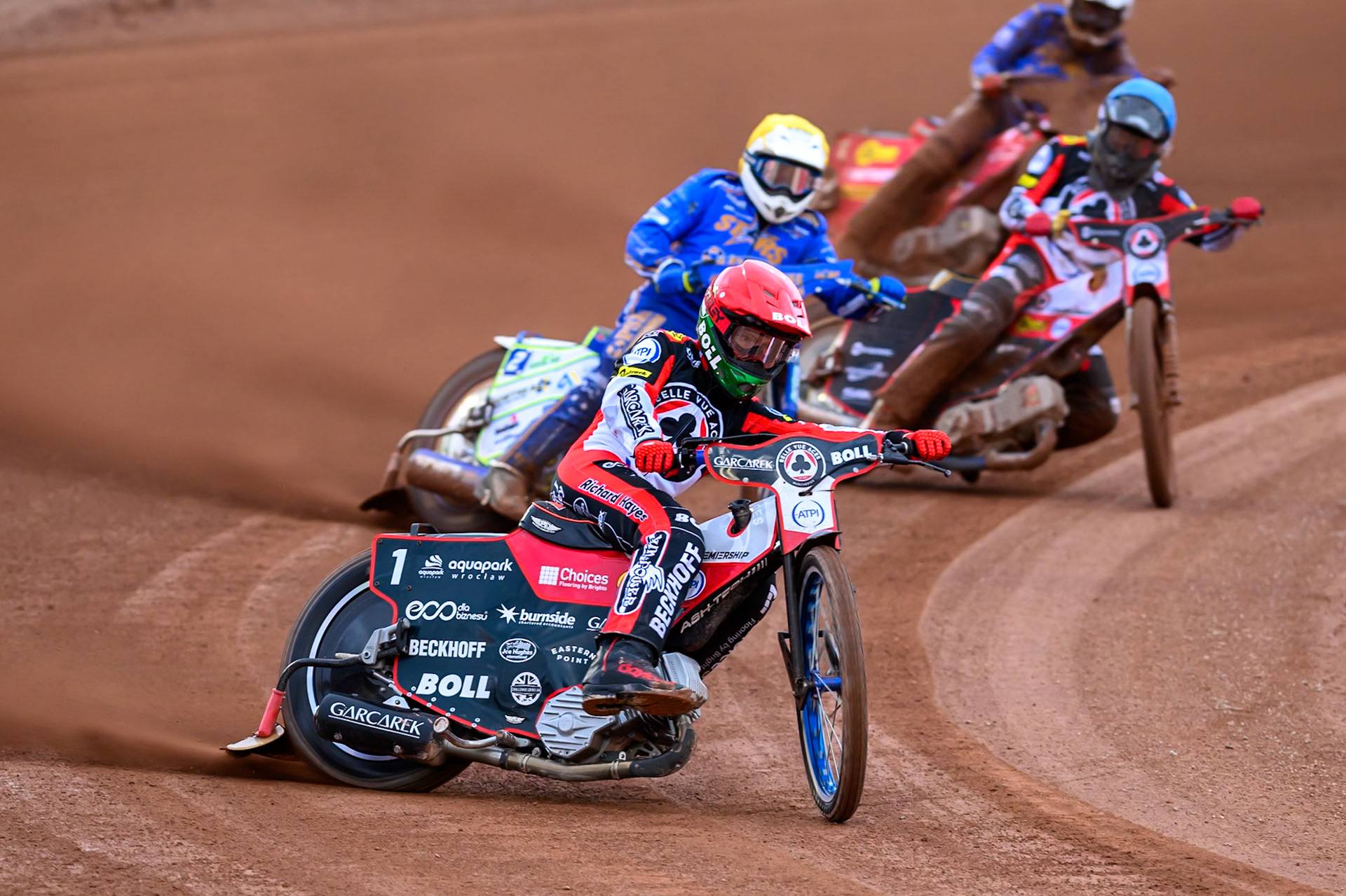 Brady Kurtz of Belle Vue Aces in Red  leading  Chris Harris of Kings Lynn Stars in Yellow and Norick Blödorn of Belle Vue Aces in Blue during the Rowe Motor Oil Premiership match between Belle Vue Aces and King's Lynn Stars at the National Speedway Stadium, Manchester on Monday 29th June 2026. (Photo: Ian Charles | MI News)