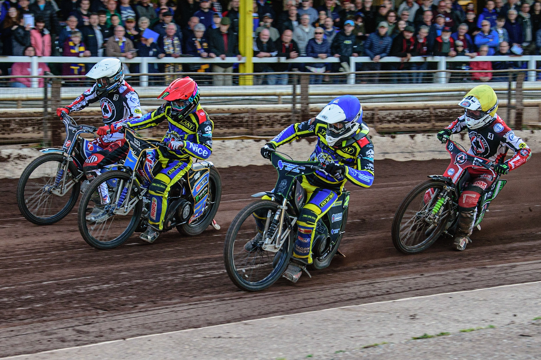 SHEFFIELD, UK. MAY 26TH  Jack Holder  (Red) and Craig Cook  (Blue) lead Matej Žagar  (White) and Charles Wright  (Yellow) into the first turn during the SGB Premiership match between Sheffield Tigers and Belle Vue Aces at Owlerton Stadium, Sheffield on Thursday 26th May 2022. (Credit: Ian Charles | MI News)