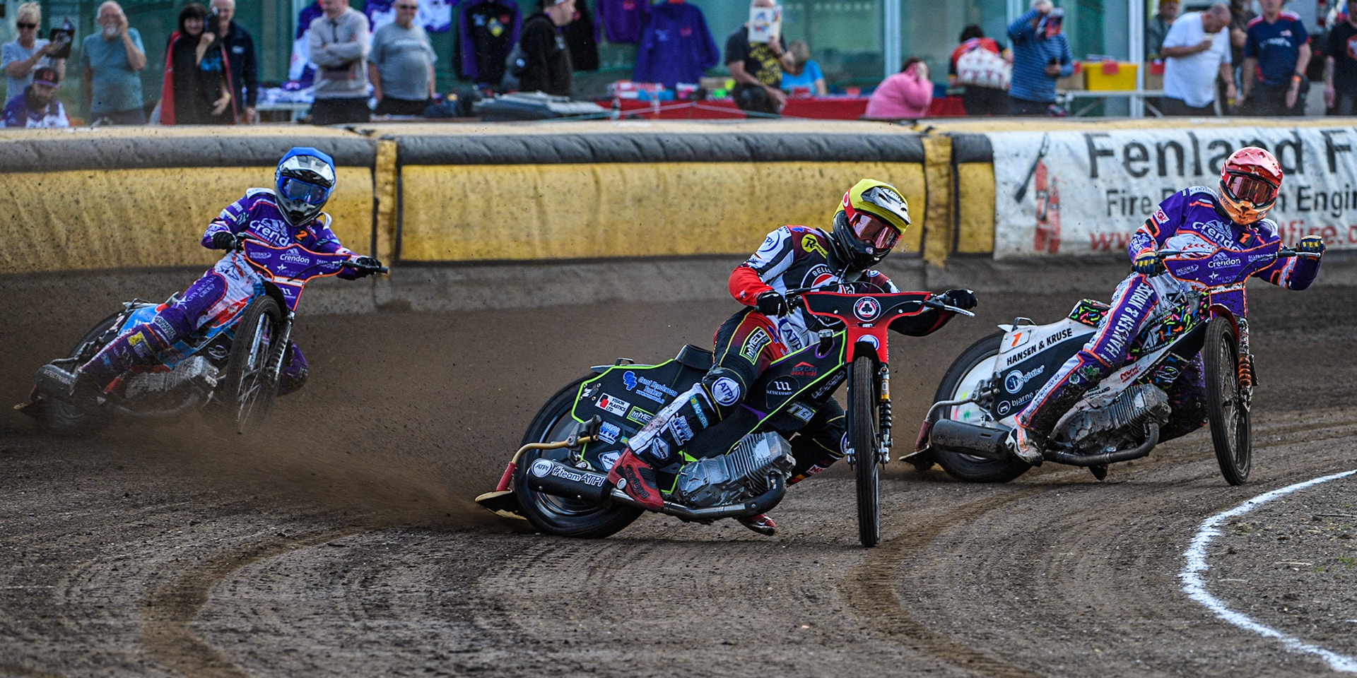Tom Brennan (Yellow) leads Niels-Kristian Iversen (Red) and Ben Cook (Blue) during the Sports Insure Premiership match between Peterborough and Belle Vue Aces at East of England Showground, Peterborough on Monday 26th June 2023. (Photo: Ian Charles | MI News)