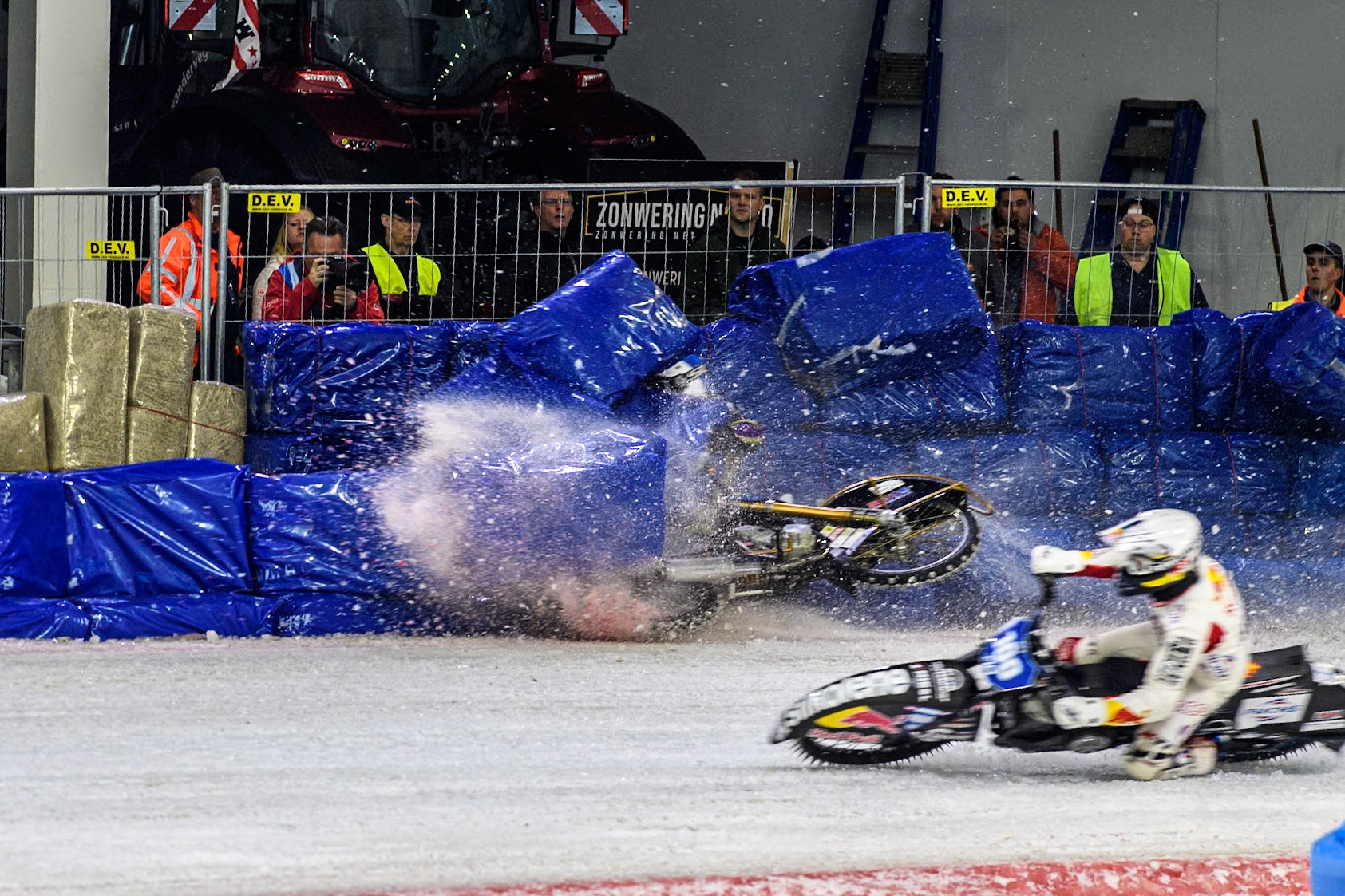 Germany's Max Niedermaier (88) crashes into the bales during the FIM Ice Speedway Gladiators World Championship Final 4 at Ice Rink Thialf, Heerenveen on Sunday 7th April 2024. (Photo: Ian Charles | MI News)