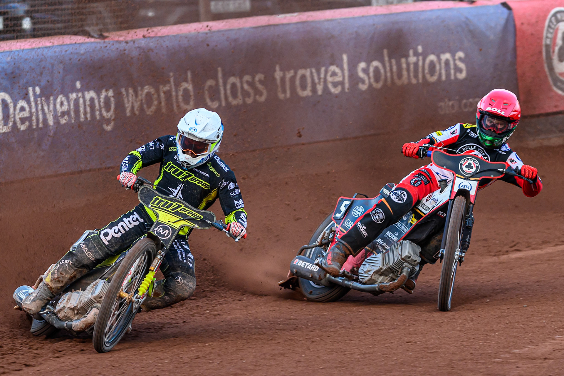 Ipswich Witches' Emil Saifutdinov  in White leading Belle Vue Aces' Brady Kurtz  in Red during the Rowe Motor Oil Premiership match between Belle Vue Aces and Ipswich Witches at the National Speedway Stadium, Manchester on Monday 30th June 2025. (Photo: Ian Charles | MI News)