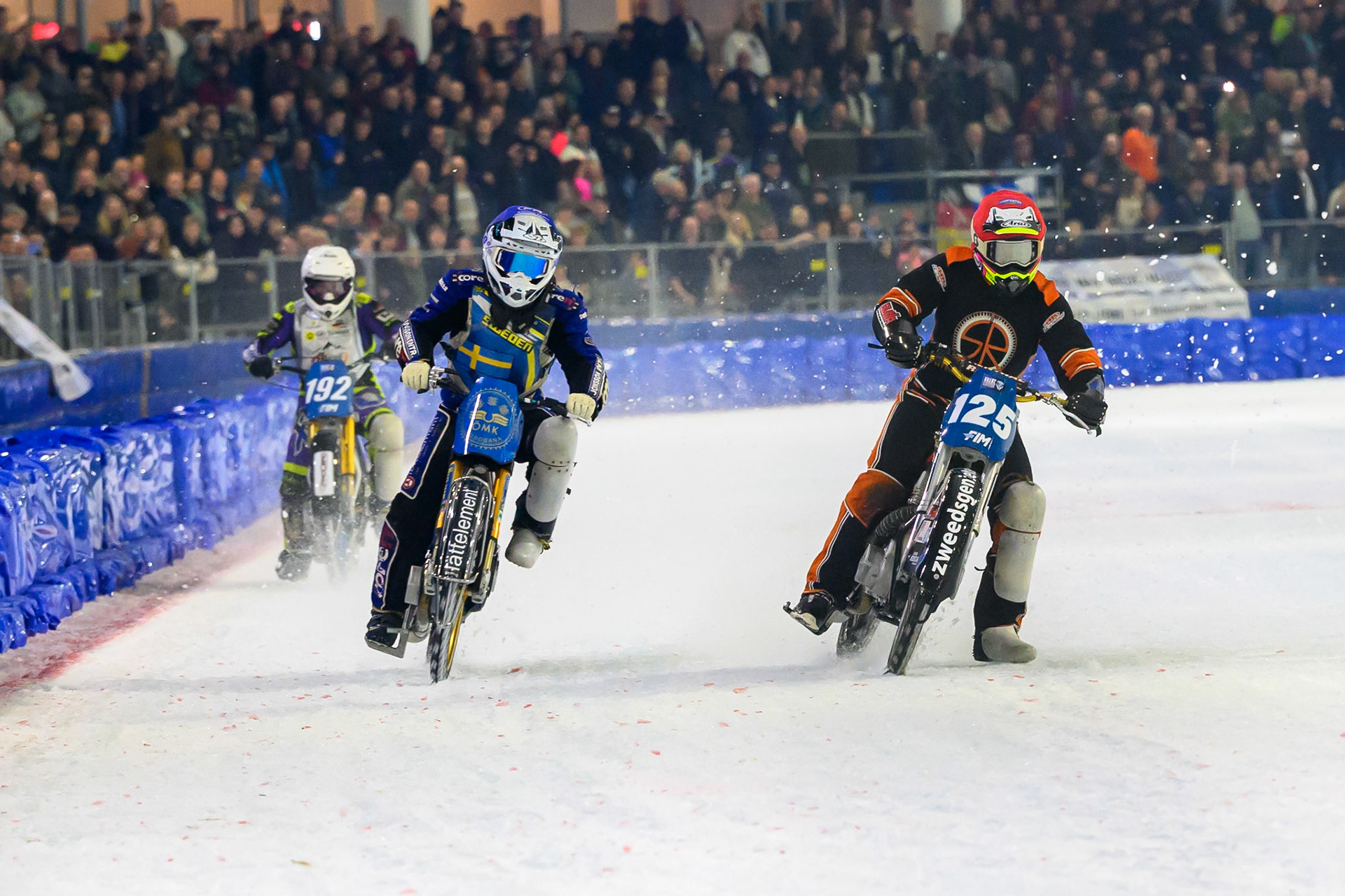 Sebastian Reitsma of The Netherlands  in Red leading Jimmy Hörnell of Sweden  in Blue and Paul Cooper of Great Britain  in White during the ROELOF THIJS BOKAAL at Ice Rink Thialf, Heerenveen on Friday 10th April 2026.  (Photo: Ian Charles | MI News)