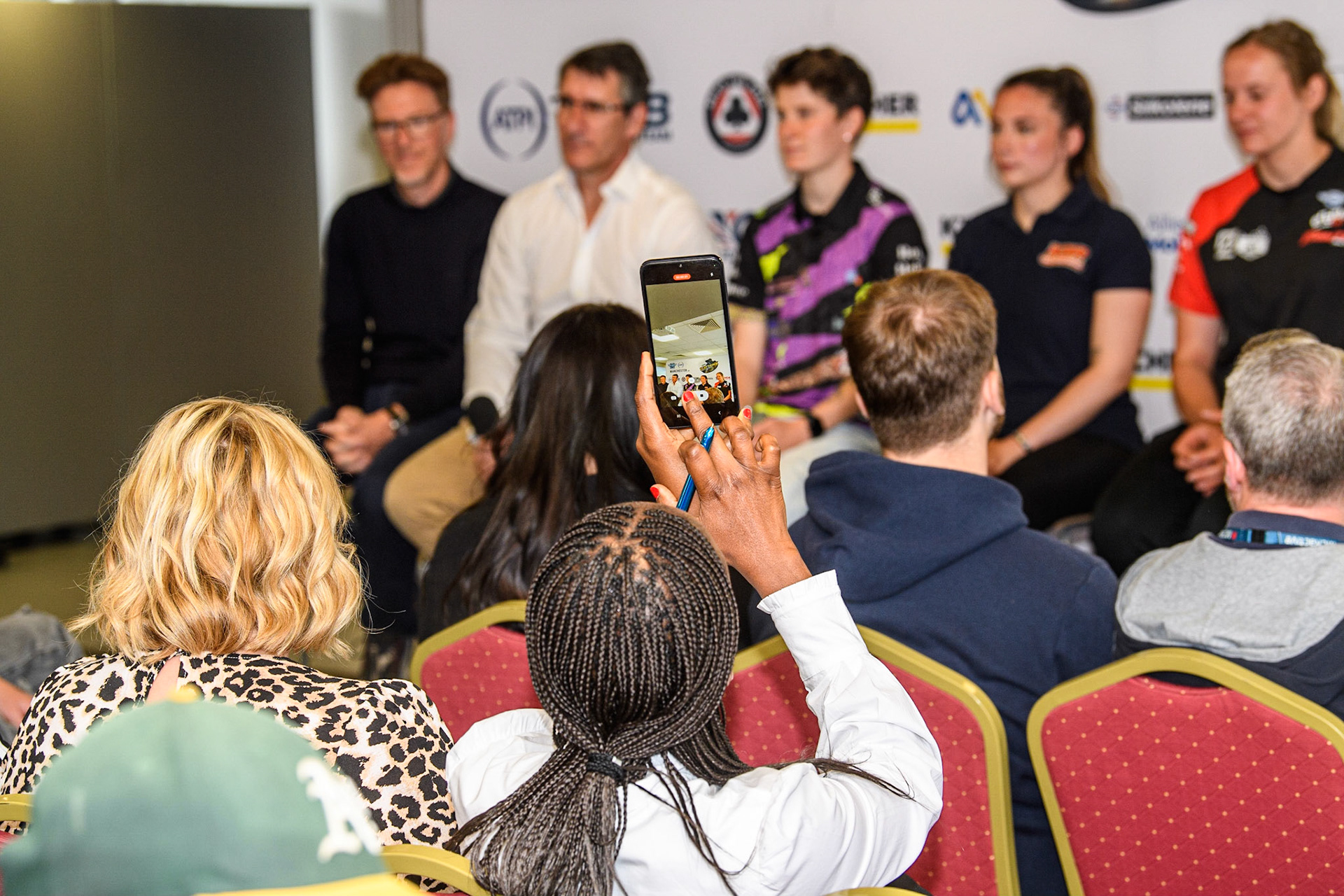 A member of the press records the panel during the FIM Flat Track World Championship &amp; FIM Women's Speedway Academy Launch at the National Speedway Stadium, Manchester on Monday 3rd July 2023. (Photo: Ian Charles | MI News)