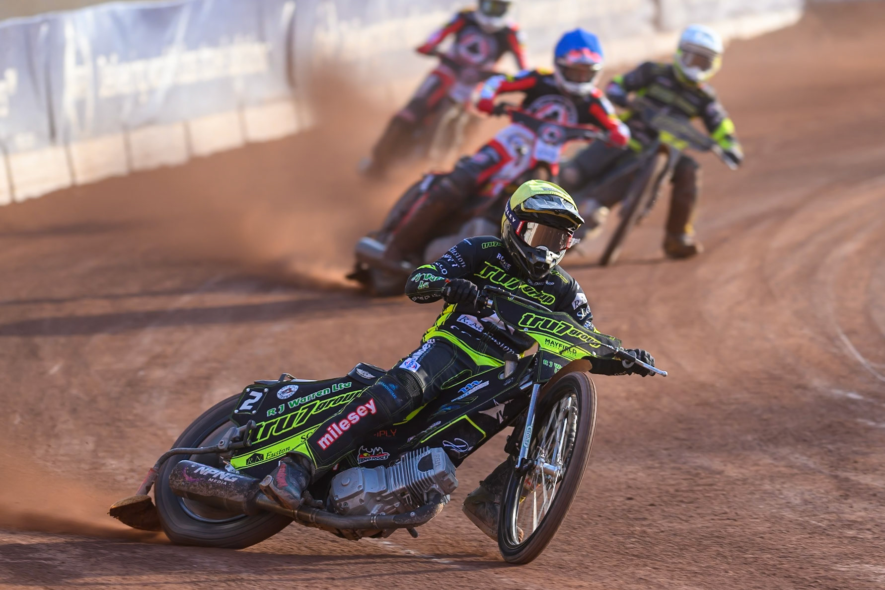Danny King of Ipswich Witches in Yellow leading Zach Cook of Belle Vue Aces in Blue Tom Brennan of Ipswich Witches in White and Peter Kildemand of Belle Vue Aces in Red during the Rowe Motor Oil Premiership match between Belle Vue Aces and Ipswich Witches at the National Speedway Stadium, Manchester on Saturday 20th June 2026. (Photo: Ian Charles | MI News)