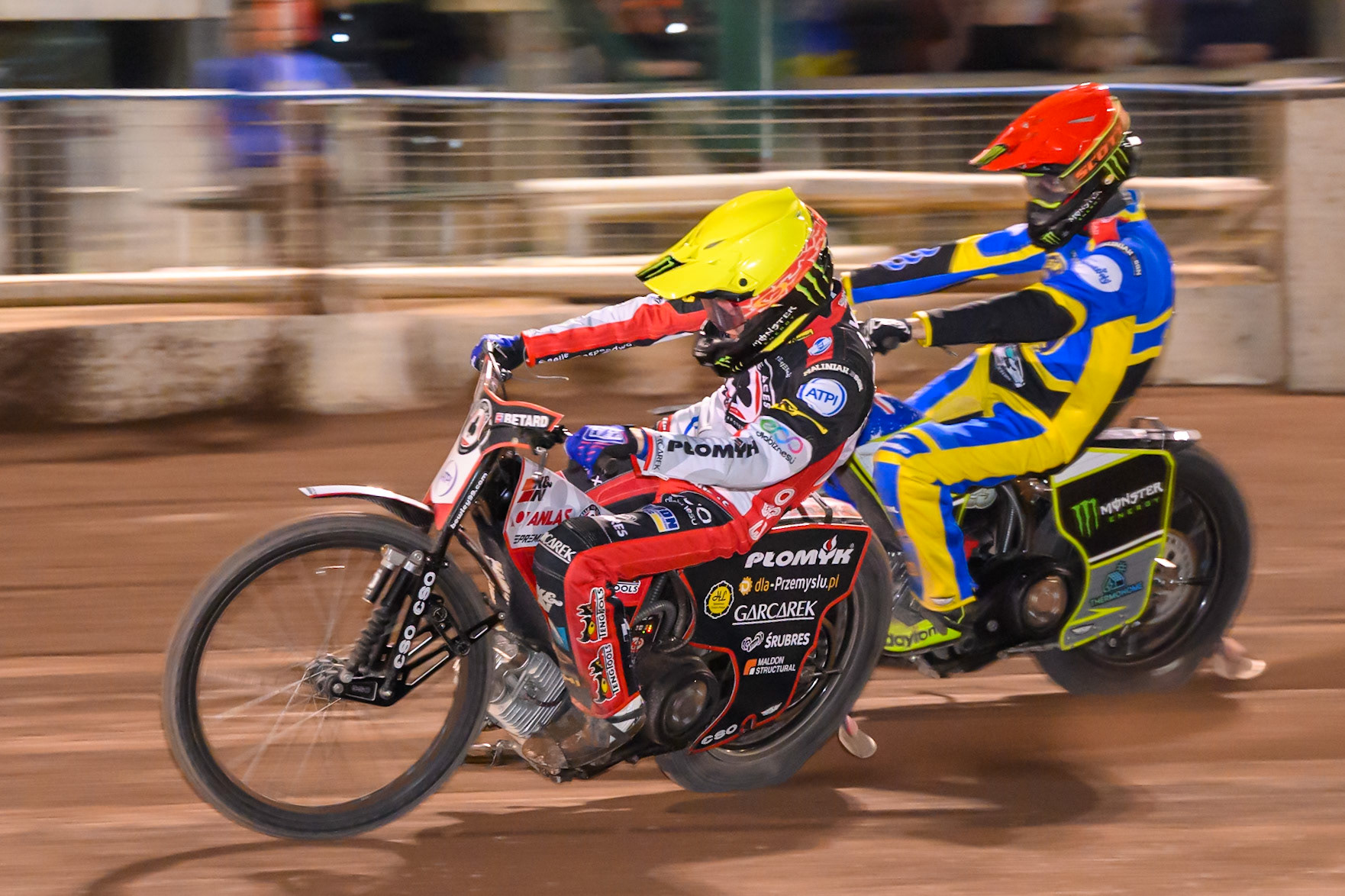 Dan Bewley of Belle Vue Aces in Yellow rides inside Chris Holder of Sheffield Tigers  in Red during the Knockout Cup Northern Section match between Sheffield Tigers and Belle Vue Aces at Owlerton Stadium, Sheffield on Thursday 2nd April 2026. (Photo: Ian Charles | MI News)