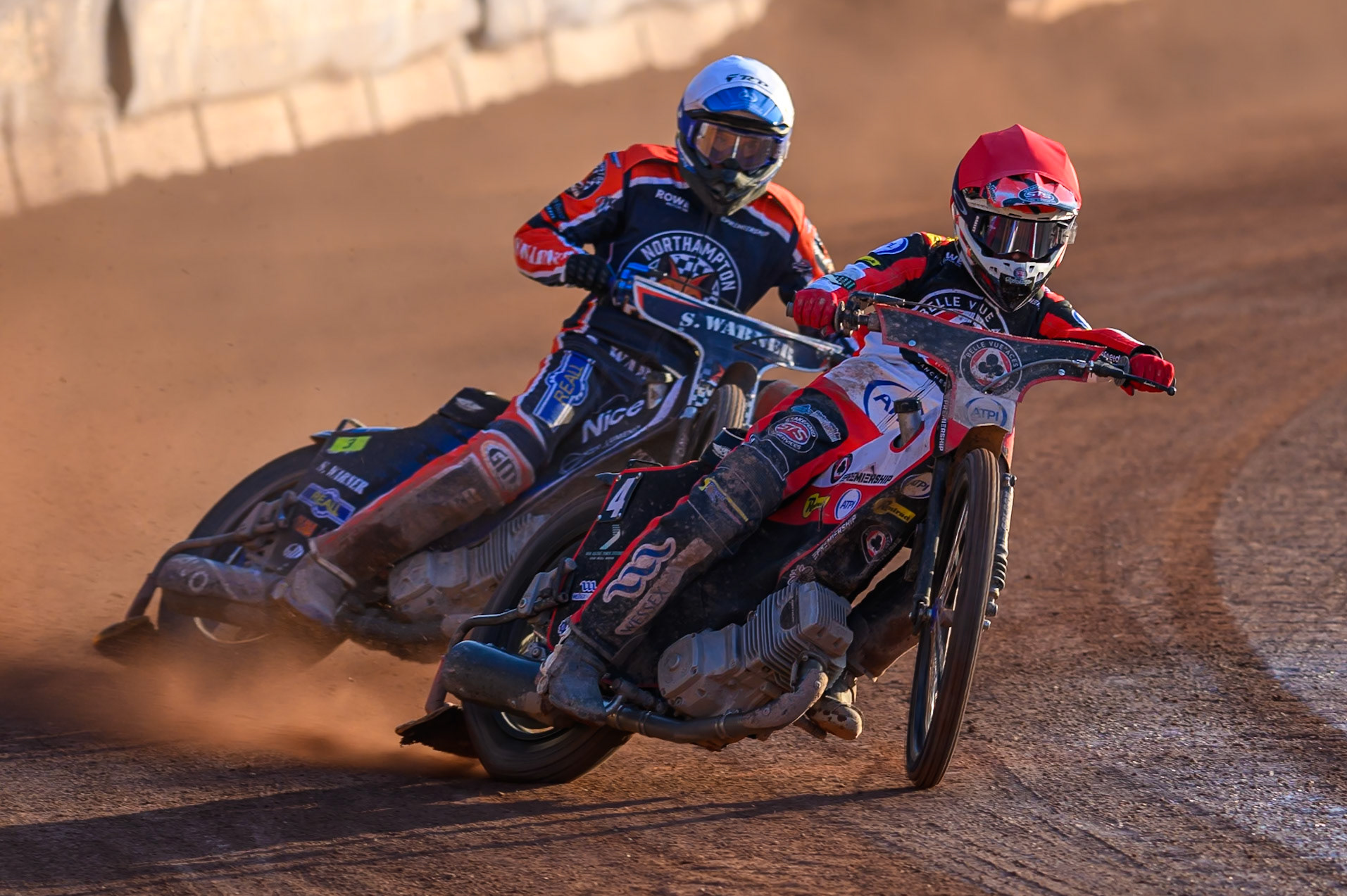 Zach Cook of Belle Vue Aces in Red leading Matej Zagar of Northampton Foxes in White during the Rowe Motor Oil Premiership match between Belle Vue Aces and Northampton Foxes at the National Speedway Stadium, Manchester on Monday 13th July 2026. (Photo: Ian Charles | MI News)