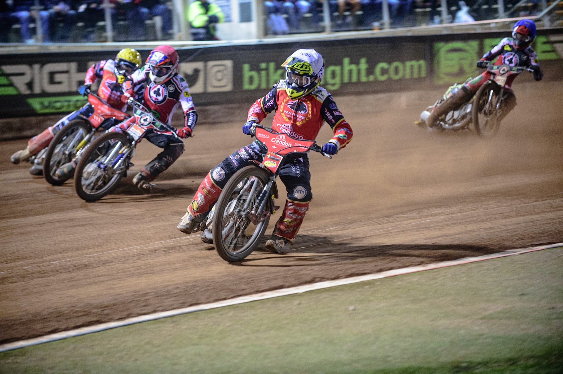 MANCHESTER, UK. OCT 11TH  Scott Nicholls  (White) inside Steve Worrall   (Red) and Bjarne Pedersen  (Yellow) with Jye Etheridge  (Blue) behind during the SGB Premiership Grand Final 1st Leg between Belle Vue Aces and Peterborough Panthers at the National Speedway Stadium, Manchester on Monday 11th October 2021. (Credit: Ian Charles | MI News)