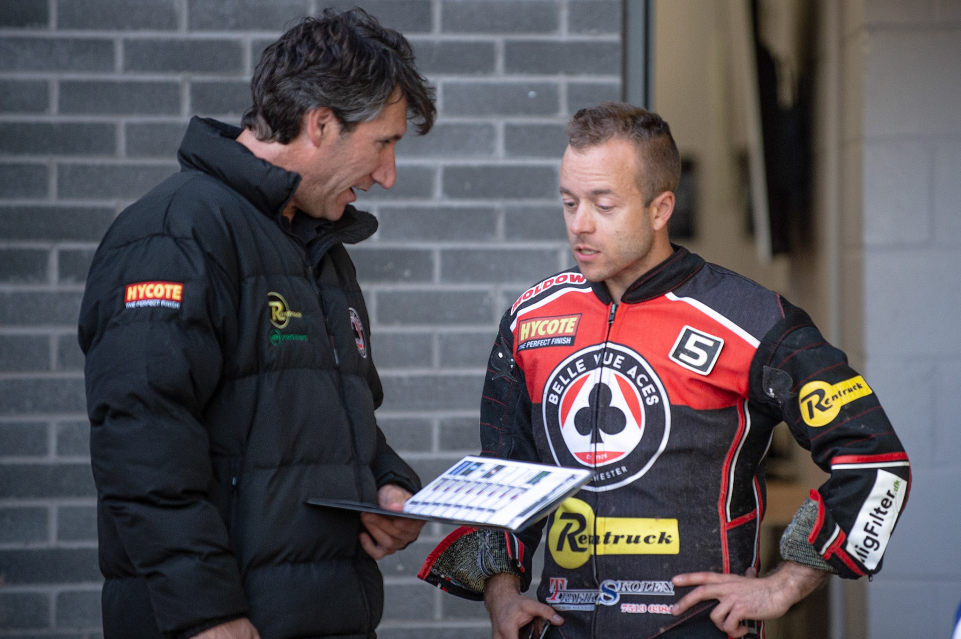Photo by Ian Charles

Mark Lemon (left) chats with Kenneth Bjerre 

Belle Vue Aces v Poole Pirates, British Speedway Premiership, Belle Vue National Speedway Stadium, Manchester, Monday 1  July  2019
