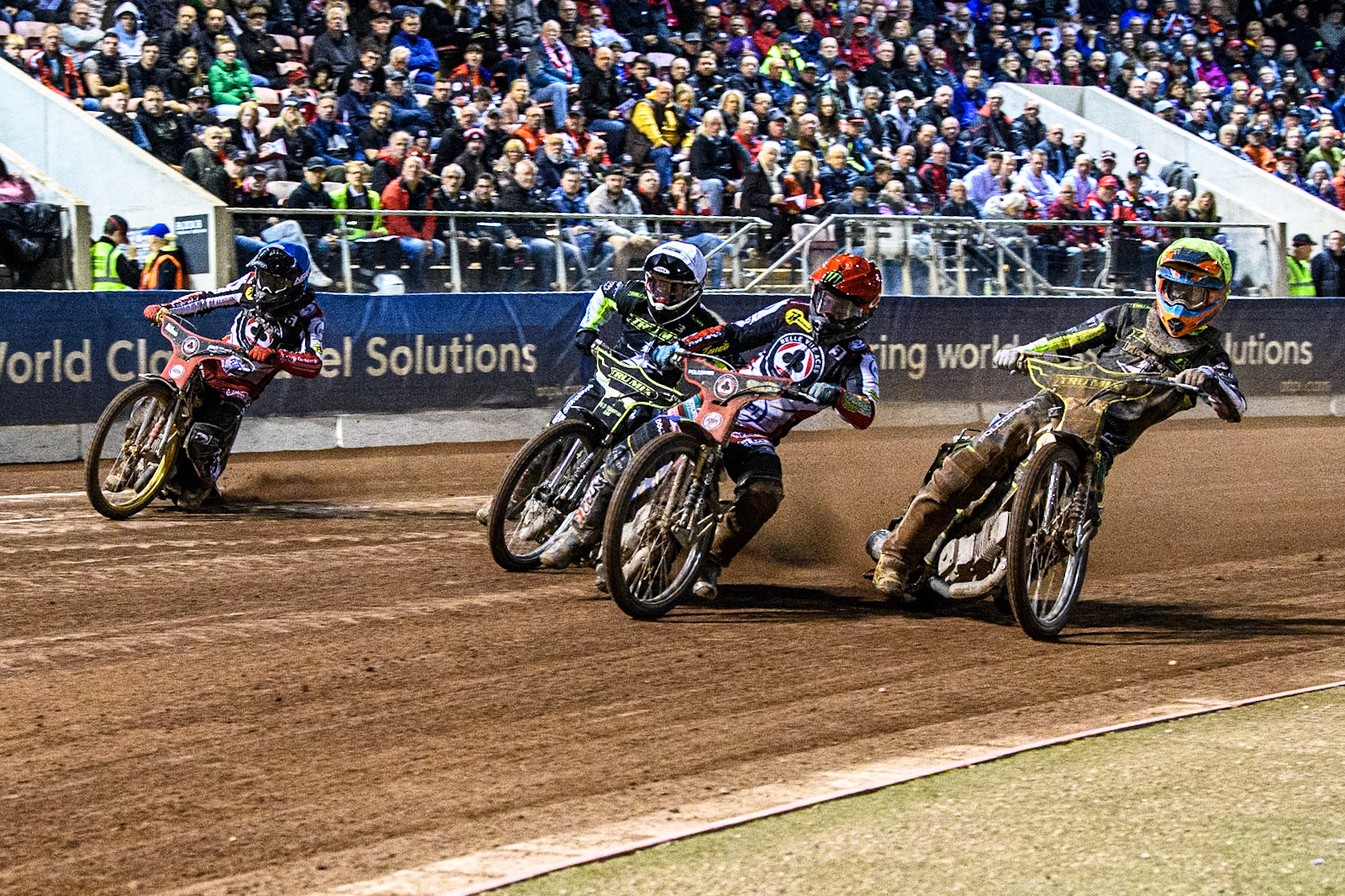 Jaimon Lidsey  (Red) leads  Danny King (White) and Keynan Rew (Yellow) during the Sports Insure Premiership Semi Final Playoff 2nd leg match between Belle Vue Aces and Ipswich Witches at the National Speedway Stadium, Manchester on Monday 25th September 2023. (Photo: Ian Charles | MI News)