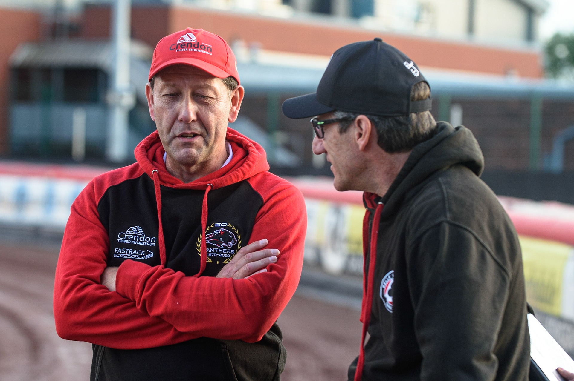 MANCHESTER, UK. AUG 9TH  Peterborough Crendon Panthers team manager Rob Lyon  (left) chats with Belle Vue BikeRight Aces  team manager Mark Lemon  during the SGB Premiership match between Belle Vue Aces and Peterborough at the National Speedway Stadium, Manchester on Monday 9th August 2021. (Credit: Ian Charles | MI News)