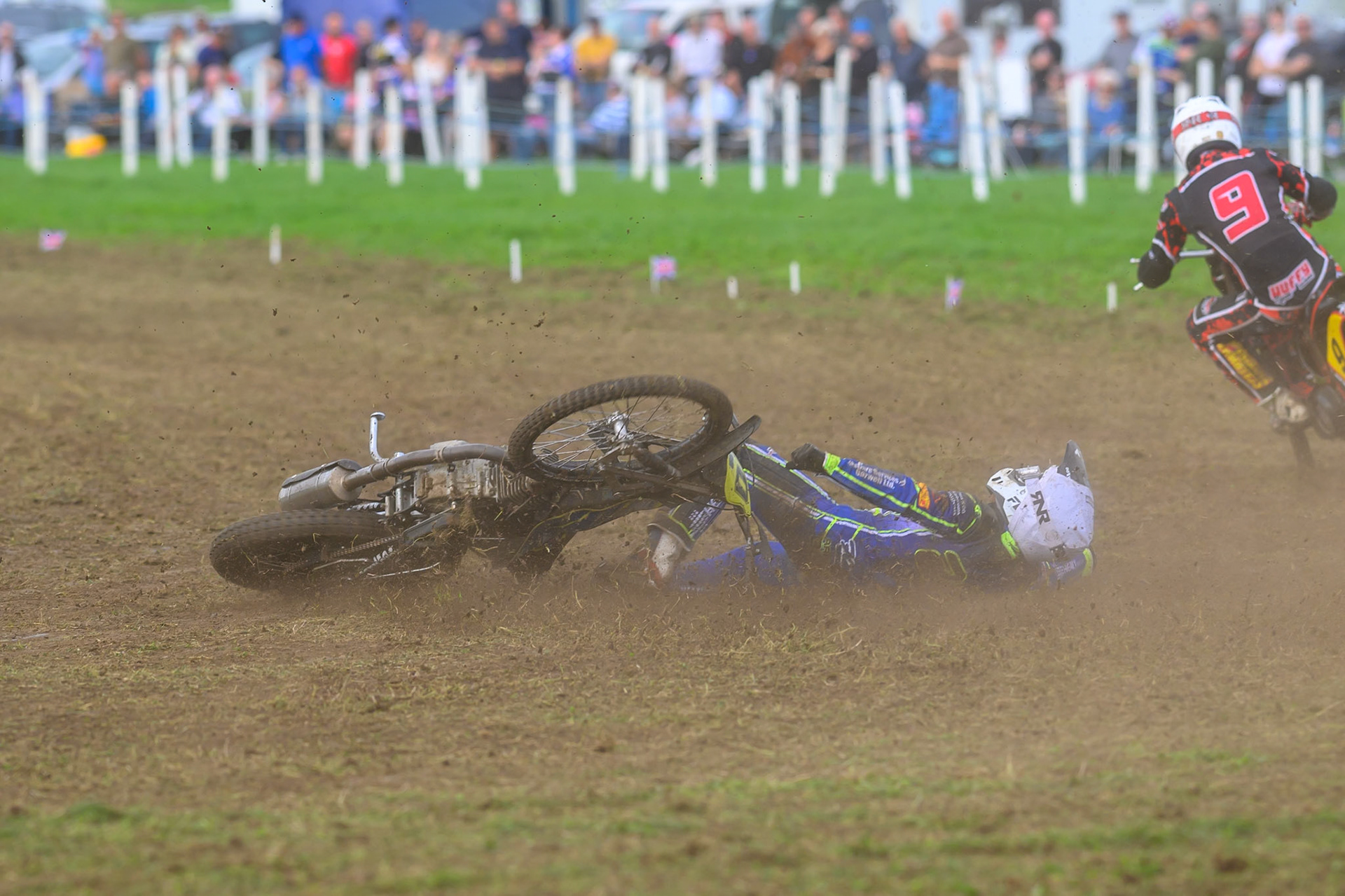 British Masters (Solos): Arran Butcher (20)  falls on the loose track during the British Masters Grasstrack Championship at Lower Marsh Farm, Much Hoole, Preston in Lancashire, England on Sunday 13th September 2026. (Photo: Ian Charles | MI News)