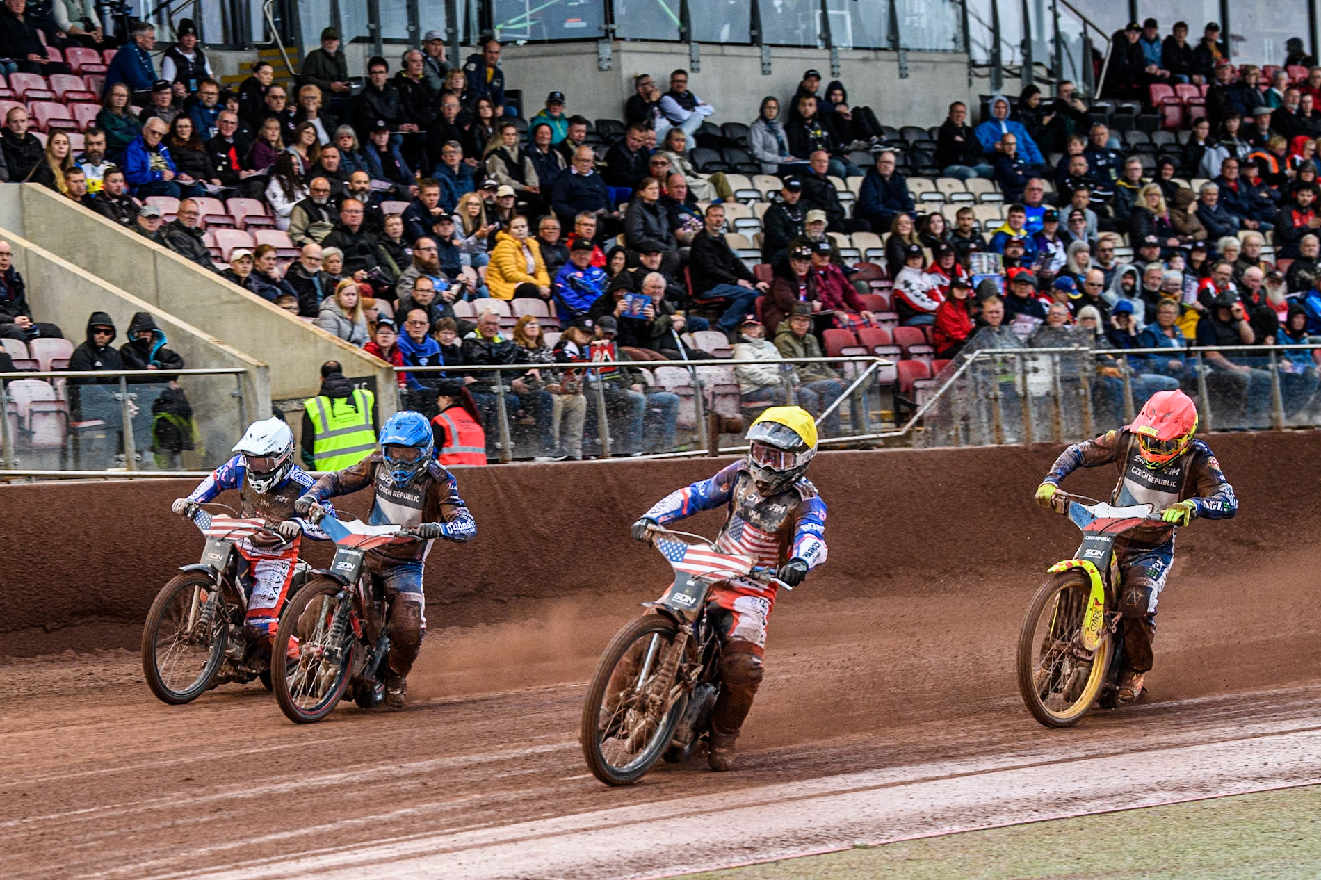 Czech Republic v USA: Luke Becker of the USA in Yellow leading Jan Kvech of The Czech Republic in Blue, Broc Nicol of the USA in White and Vaclav Milik of The Czech Republic in Red during the Monster Energy FIM Speedway of Nation Semi Final 2 at the National Speedway Stadium, Manchester on Wednesday 10th July 2024. (Photo: Ian Charles | MI News)