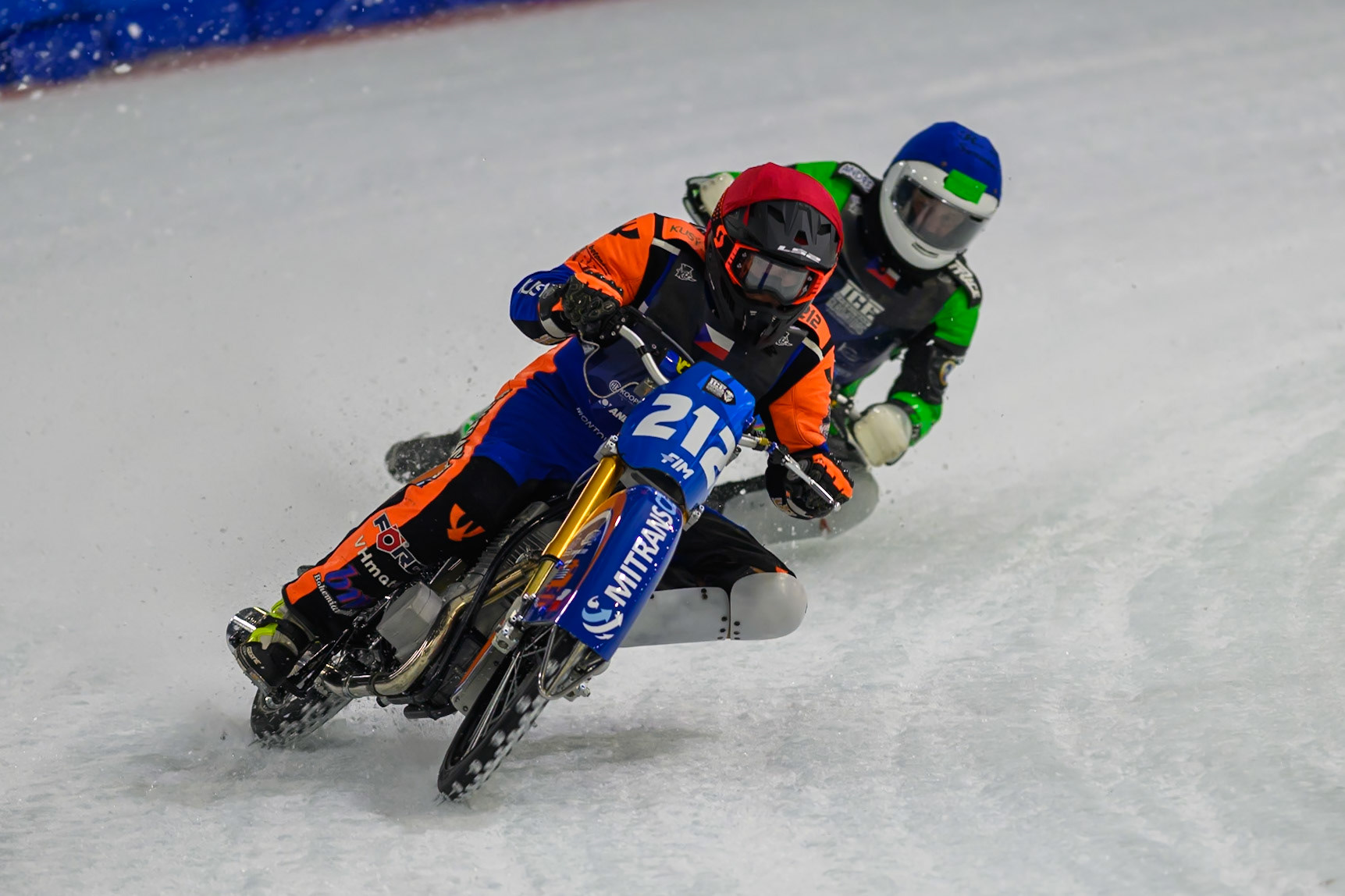 Lukas Hutla (212) of Czechia hits a rut in the ice in front of Andrej Divis (107) of Czechia in Blue during the FIM Ice Speedway Gladiators World Championship Final 3 at Ice Rink Thialf, Heerenveen on Saturday 11th April 2026. (Photo: Ian Charles | MI News)
