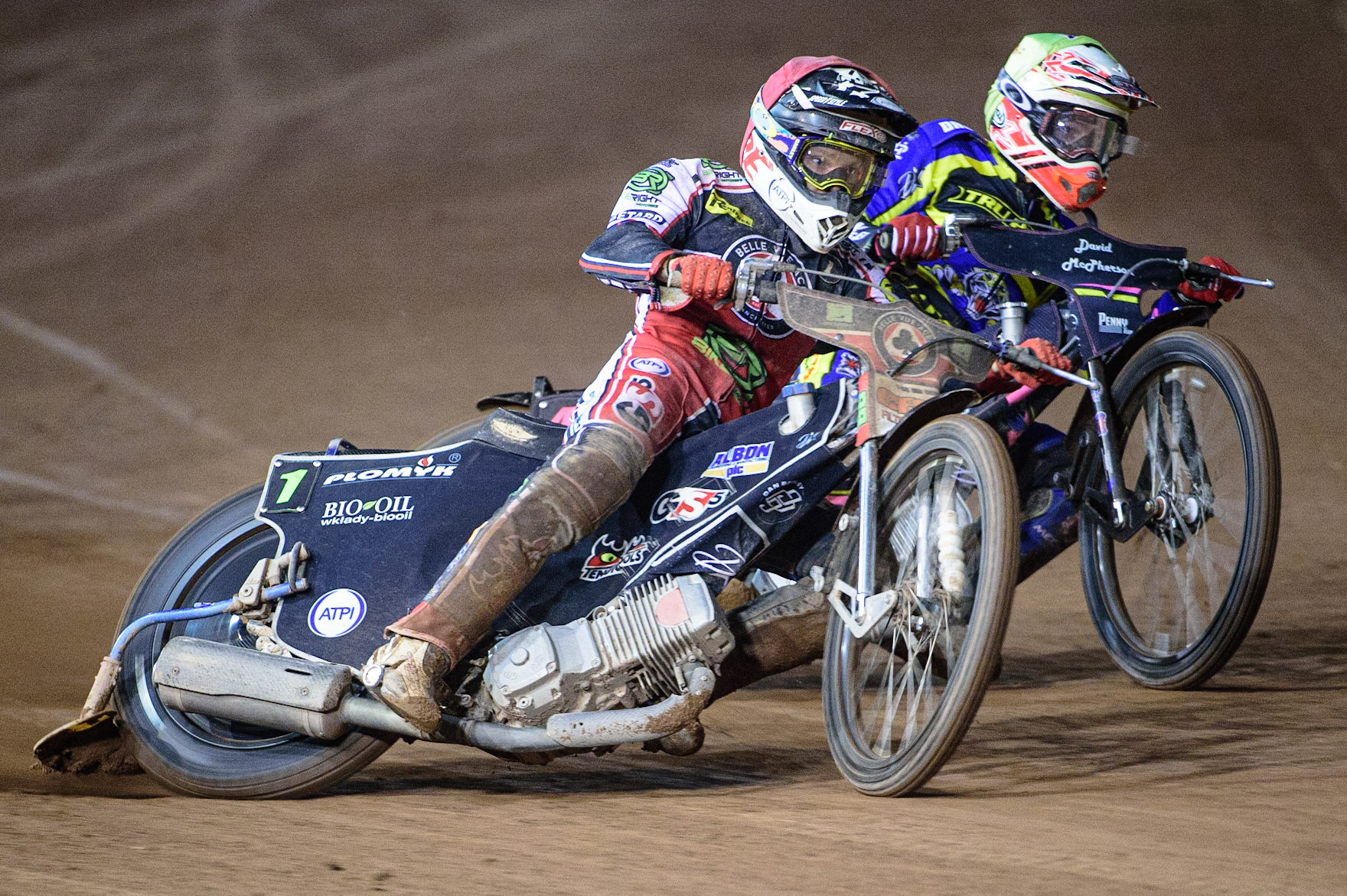 MANCHESTER, UK. OCT 7TH  Dan Bewley  (Red) leads Josh Pickering   (Yellow) during the SGB Premiership Play off Semi-Final Second Leg between Belle Vue Aces and Sheffield Tigers at the National Speedway Stadium, Manchester on Thursday 7th October 2021. (Credit: Ian Charles | MI News)