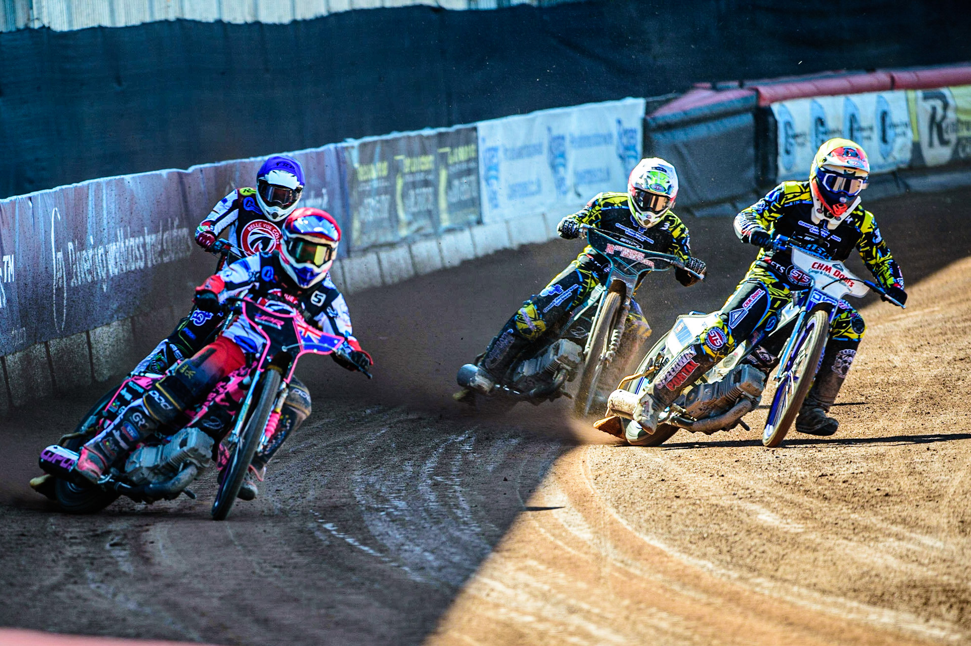 James Pearson   (Red) outside Mason Watson (White) with Danny Phillips  (Yellow) and Paul Bowen   (Blue) behind during the National Development League match between Belle Vue Colts and Berwick Bullets at the National Speedway Stadium, Manchester on Friday 7th April 2023. (Photo: Ian Charles | MI News)