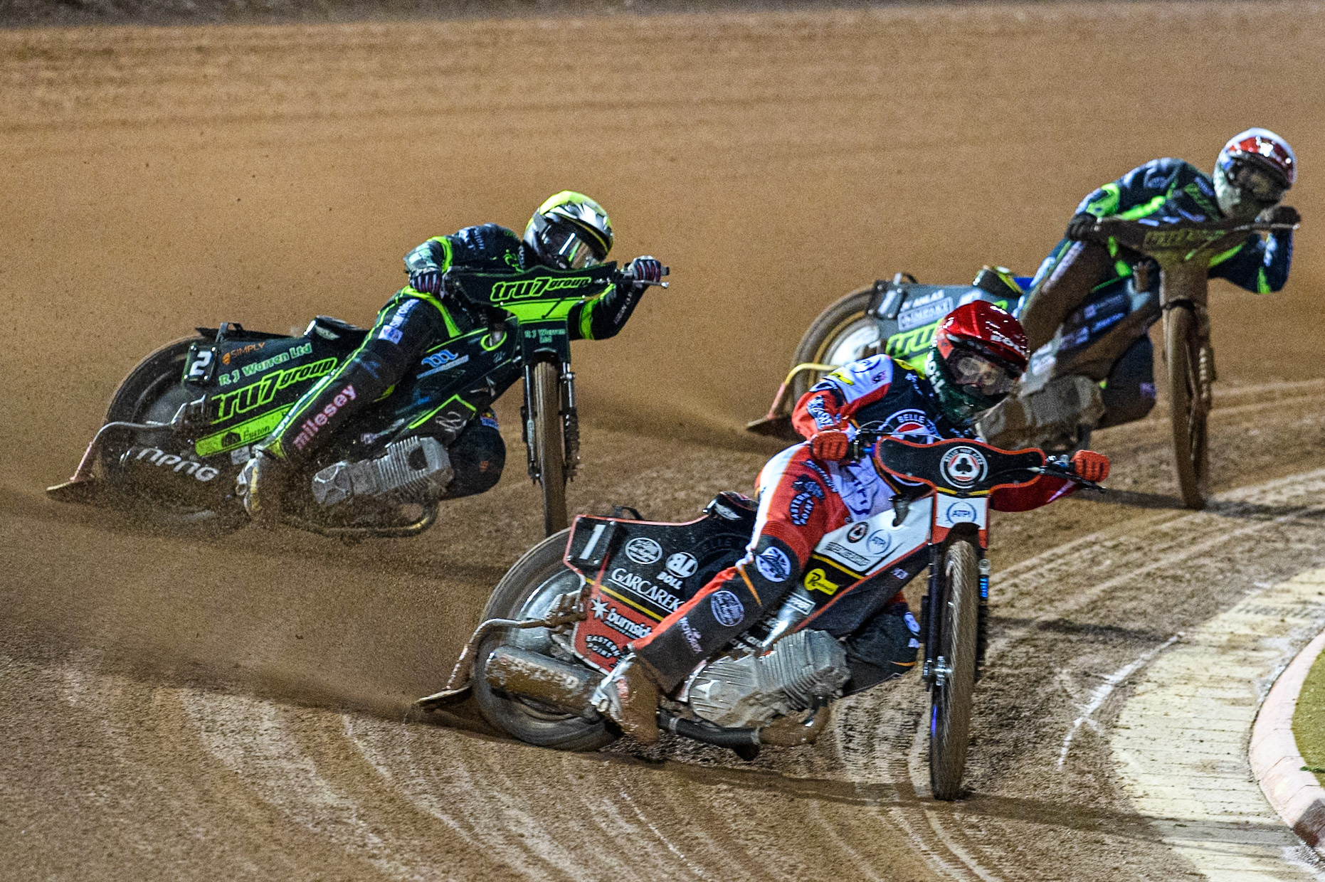 Brady Kurtz of Belle Vue Aces in Red leading Danny King of Ipswich Witches in Yellow and Jason Doyle of Ipswich Witches in White during the Premiership Cup Quarter Final 1st Leg match between Belle Vue Aces and Ipswich Witches at the National Speedway Stadium, Manchester on Monday 24th March 2025. (Photo: Ian Charles | MI News)