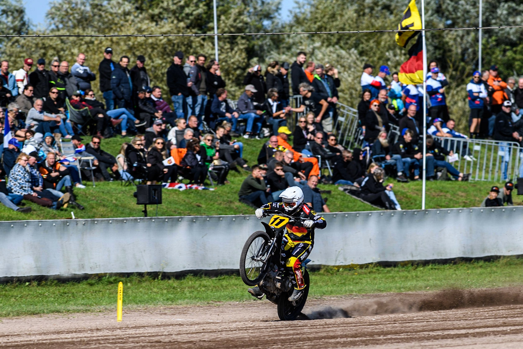 Erik Riss does a wheelie for the fans during the FIM Long Track Of Nations event at the Speed Centre Roden on Sunday 24th September 2023. (Photo: Ian Charles | MI News)