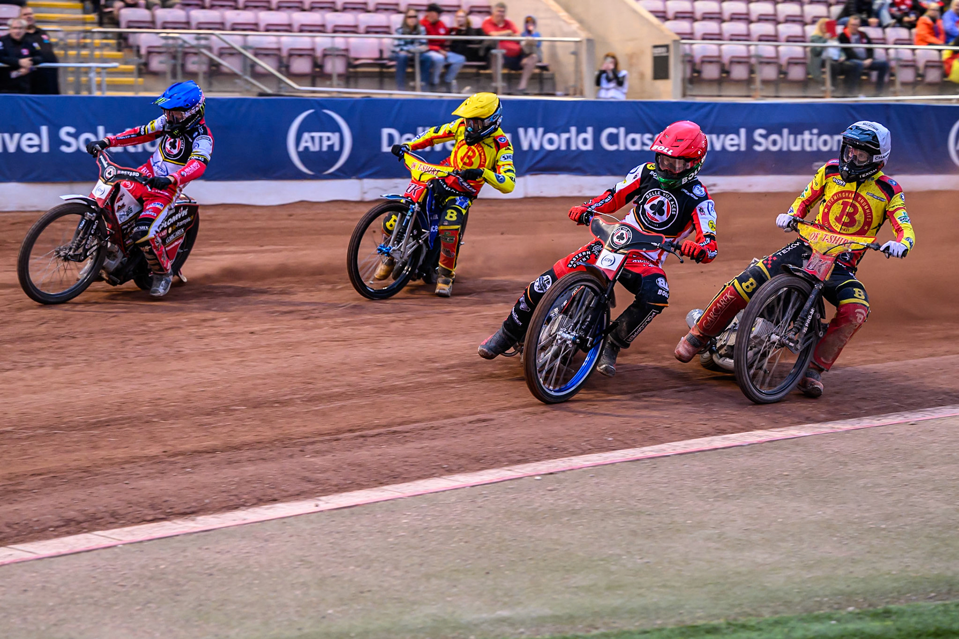 Belle Vue Aces' Brady Kurtz  in Red on the inside with Birmingham Brummies' Tobias Musielak  in White , Birmingham Brummies' Matej Zagar  in Yellow and Belle Vue Aces' Dan Bewley  in Blue during the Rowe Motor Oil Premiership match between Belle Vue Aces and Birmingham Brummies at the National Speedway Stadium, Manchester on Monday 7th July 2025. (Photo: Ian Charles | MI News)