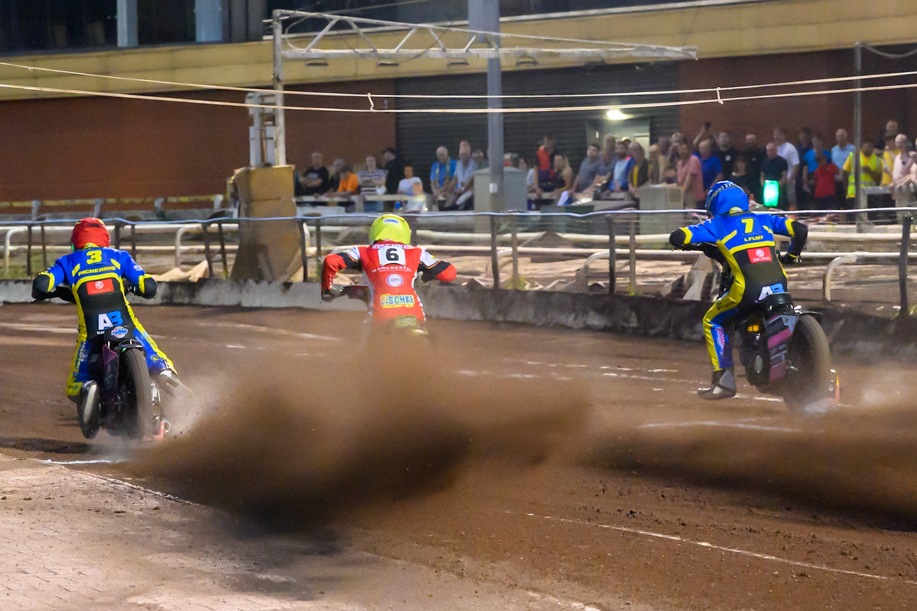 (L to R) Josh Pickering of Sheffield Tigers  in Red, Tate Zischke of Belle Vue Aces   in Yellow and Leon Flint of Sheffield Tigers  leave the start line during the Rowe Motor Oil Premiership match between Sheffield Tigers and Belle Vue Aces at Owlerton Stadium, Sheffield on Monday 11th August 2025. (Photo: Ian Charles | MI News)