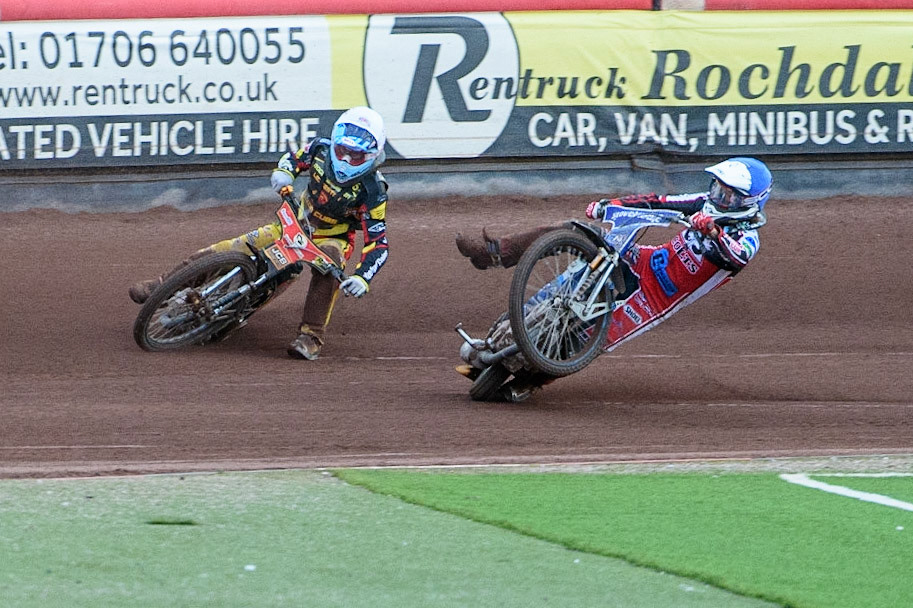 MANCHESTER, UK. JULY 29TH   Harry McGurk (Blue) picks up some drive and falls during the National Development League match between Belle Vue Colts and Leicester Lion Cubs at the National Speedway Stadium, Manchester on Thursday 29th July 2021. (Credit: Ian Charles | MI News)