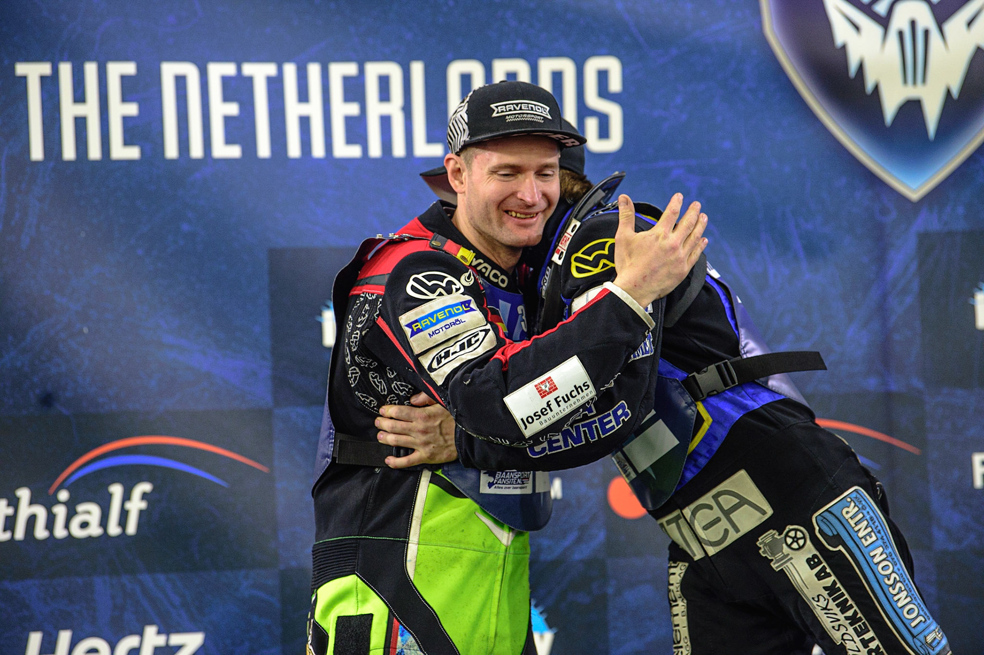 HEERENVEEN, NL.  Martin Hååruhiltunen (199)  consoles Johann Weber (33)  during the FIM Ice Speedway Gladiators World Championship Final 4 at Ice Rink Thialf, Heerenveen on Sunday  3 April 2022. (Credit: Ian Charles | MI News)