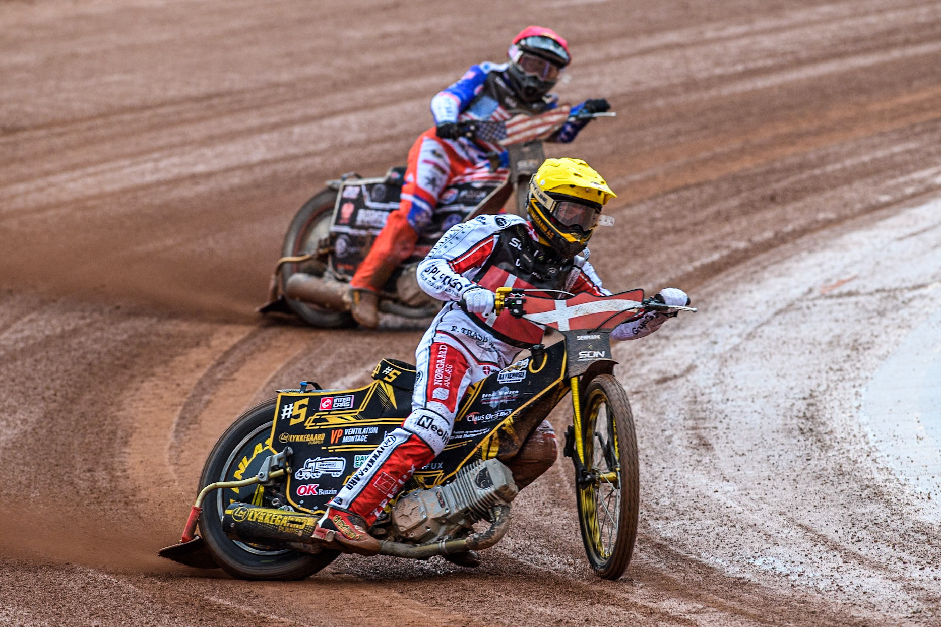 Anders Thomsen of Denmark in Yellow leading Broc Nicol of the USA in Red during the Monster Energy FIM Speedway of Nation Semi Final 2 at the National Speedway Stadium, Manchester on Wednesday 10th July 2024. (Photo: Ian Charles | MI News)