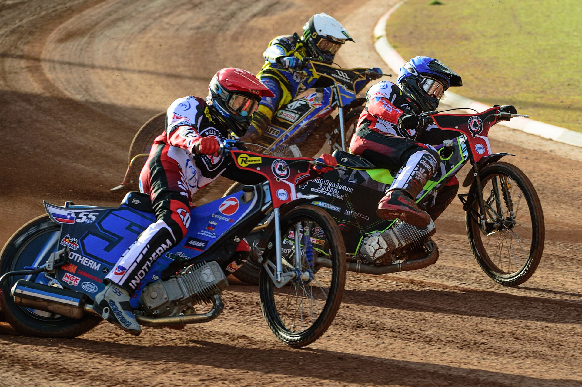 MANCHESTER, UK. JUL 5TH  Matej Zagar  (Red) outside Tom Brennan  (Blue) and Jack Holder  (White)  during the SGB Premiership match between Belle Vue Aces and Sheffield Tigers at the National Speedway Stadium, Manchester on Tuesday 5th July 2022. (Credit: Ian Charles | MI News)