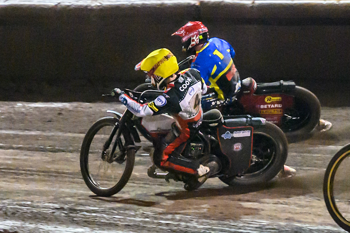 Zach Cook of Belle Vue Aces in Yellow on the inside of Max Fricke, Guest Rider for Sheffield Tigers in Red during the Rowe Motor Oil Premiership Grand Final 1st Leg match between Sheffield Tigers and Belle Vue Aces at Owlerton Stadium, Sheffield on Monday 12th October 2026. (Photo: Ian Charles | MI News)