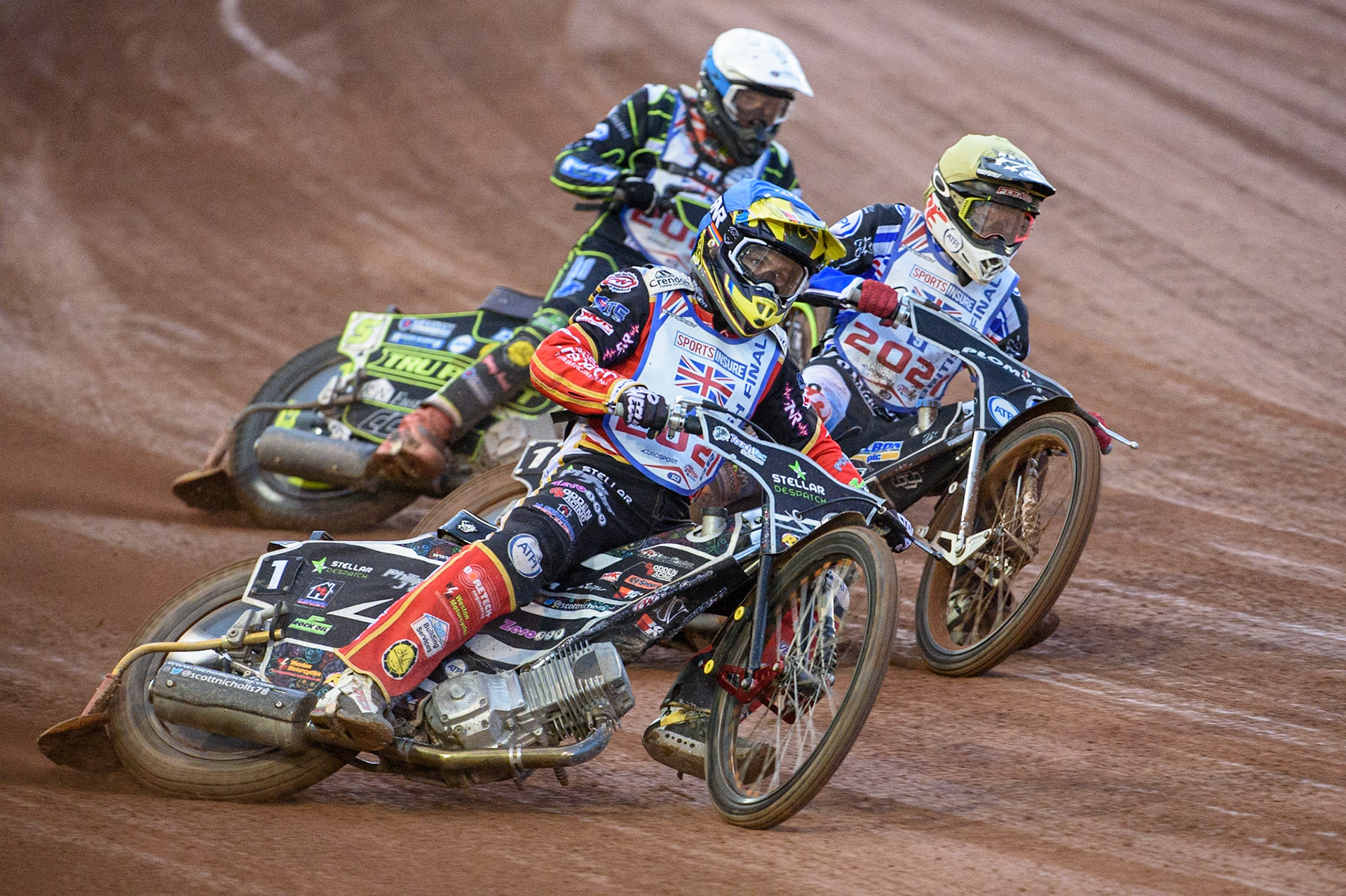 MANCHESTER, UK. AUGUST 16TH   Scott Nicholls  (Blue) outside Dan Bewley (Yellow) with Craig Cook  (White) behind during the Sports Insure British Speedway Finals at the National Speedway Stadium, Manchester on Monday 16th August 2021. (Credit: Ian Charles | MI News)