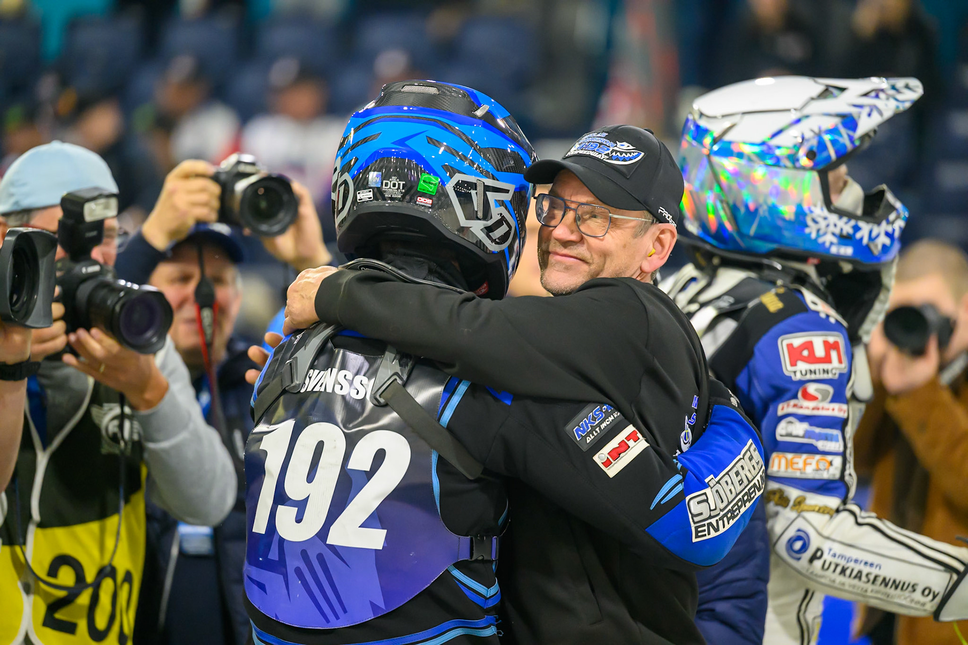 Niclas Svensson (192) of Sweden  gets a hug from his father Stefan during the FIM Ice Speedway Gladiators World Championship Final 3 at Ice Rink Thialf, Heerenveen on Saturday 11th April 2026. (Photo: Ian Charles | MI News)