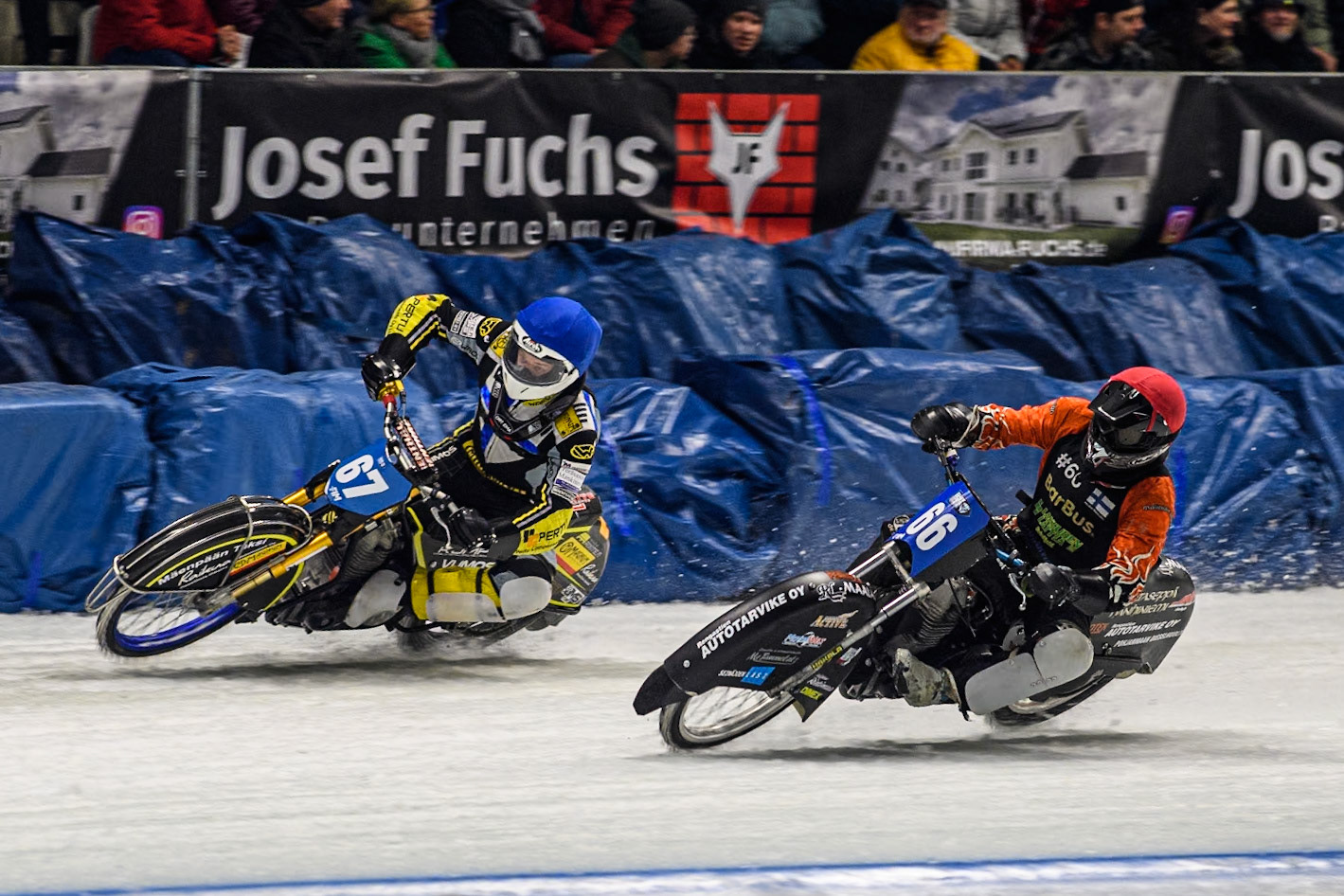 Finland's Aki Ala-Riihimäki (66) (Red) inside Finland's Heikki Huusko (67) (Blue) during the FIM Ice Speedway Gladiators World Championship Final 1 at the Max-Aicher-Arena, Inzell on Saturday 23 March 2024. (Photo: Ian Charles | MI News)