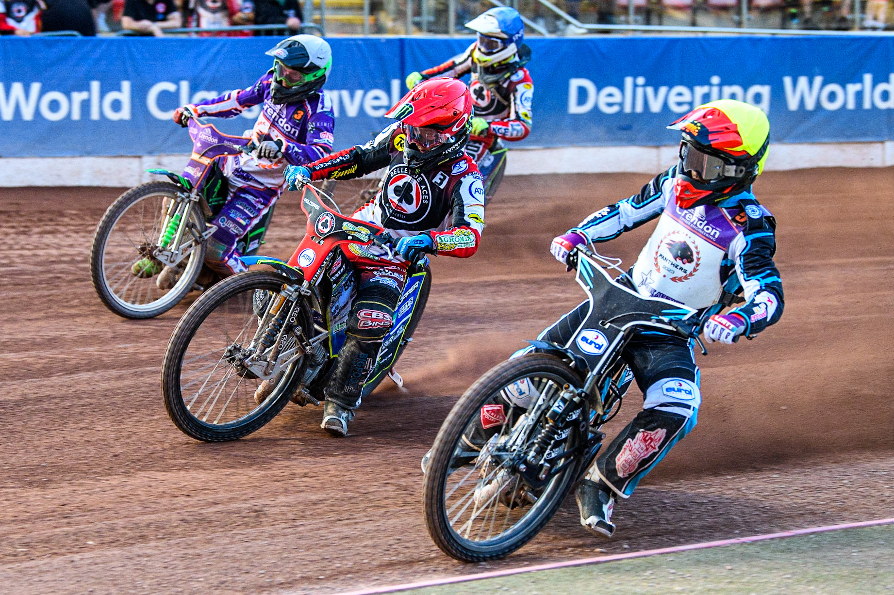 Vadim Tarasenko (Yellow) inside Jaimon Lidsey (Red), Benjamin Basso (White) and Jake Mulford (Blue) during the Sports Insure Premiership match between Belle Vue Aces and Peterborough at the National Speedway Stadium, Manchester on Monday 19th June 2023. (Photo: Ian Charles | MI News)