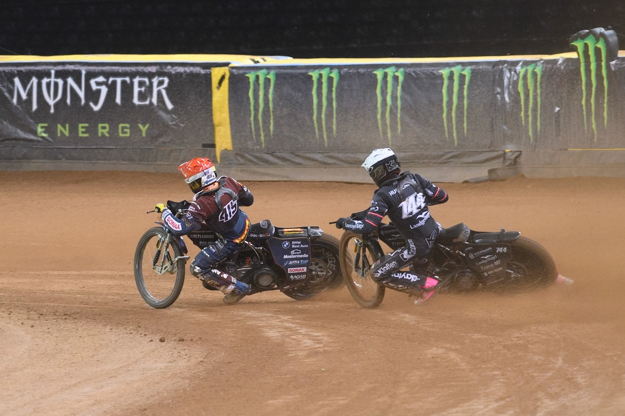 Kai Huckenbeck (744) of Germany in White chases Dominik Kubera (415) of Poland during the FIM Speedway Grand Prix of Great Britain at The Principality Stadium, Cardiff on Saturday 17th August 2024. (Photo: Ian Charles | MI News)
