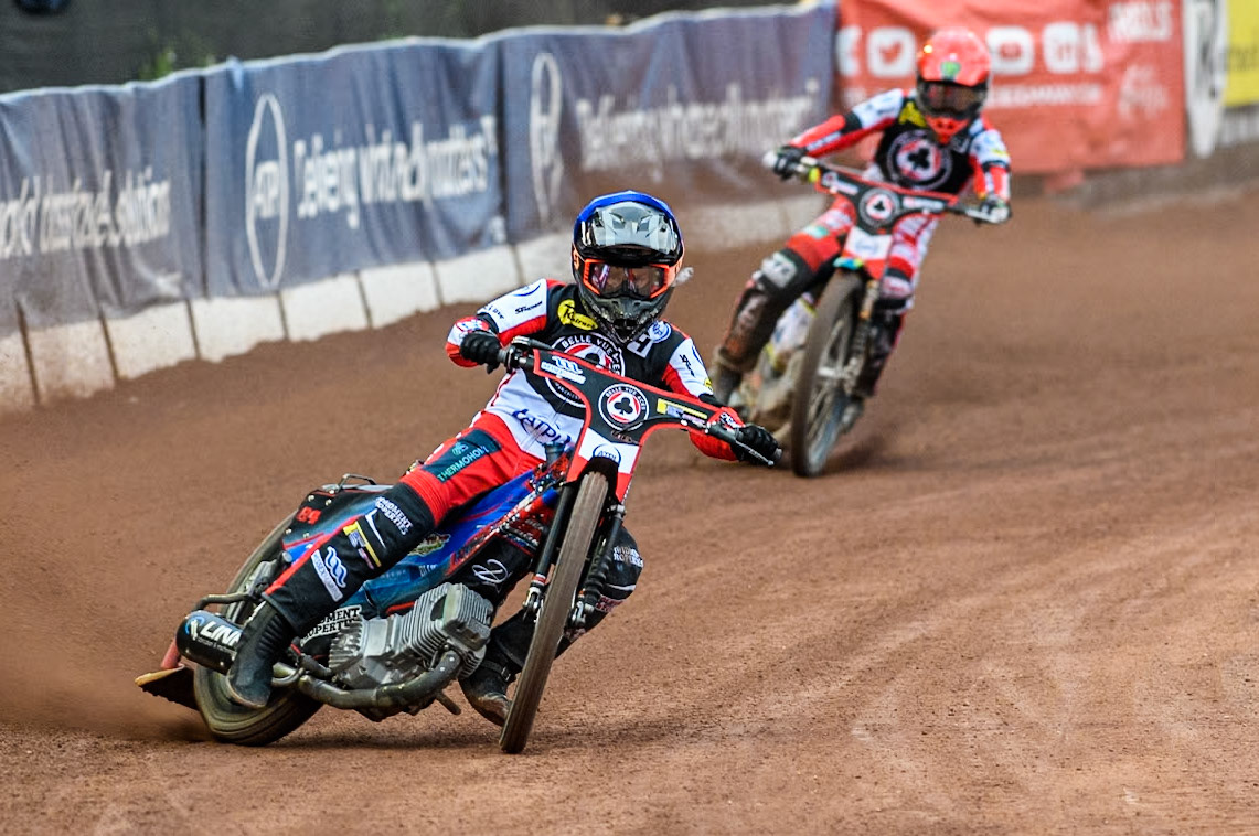 Belle Vue Aces' Ben Cook in Blue leading team mate Belle Vue Aces' Jaimon Lidsey in Red during the Rowe Motor Oil Premiership match between Belle Vue Aces and King's Lynn Stars at the National Speedway Stadium, Manchester on Monday 20th May 2024. (Photo: Ian Charles | MI News)