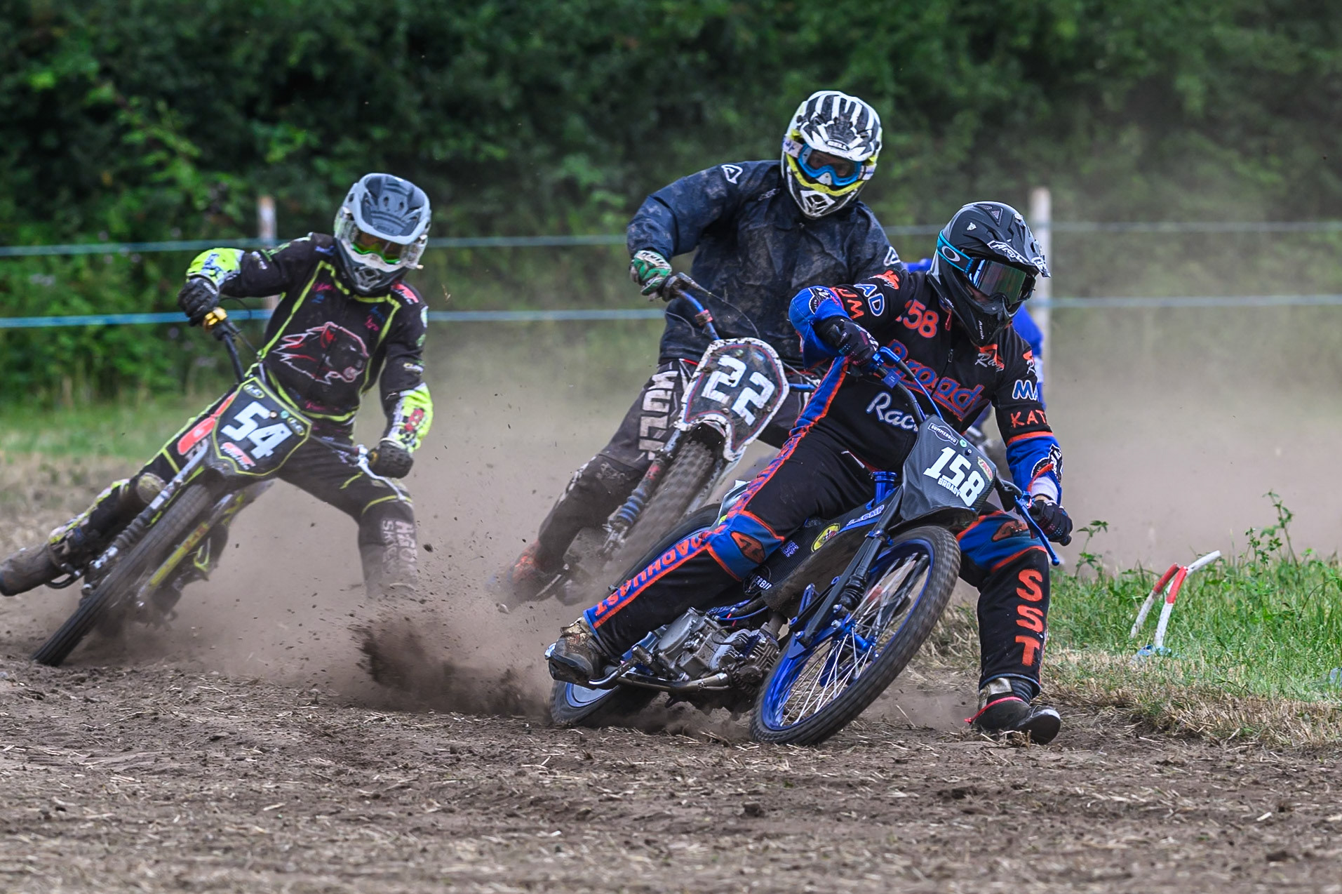 Wayne Broadhurst (158) leading Ian Clark (54) and Phil Thomas (22) in the GT140 Class during the ACU Northern Grass Track Riders Championship at Cheshire Grass Track Club, Frog Lane, Knutsford, Cheshire on Sunday 20th July 2025. (Photo: Ian Charles | MI News)