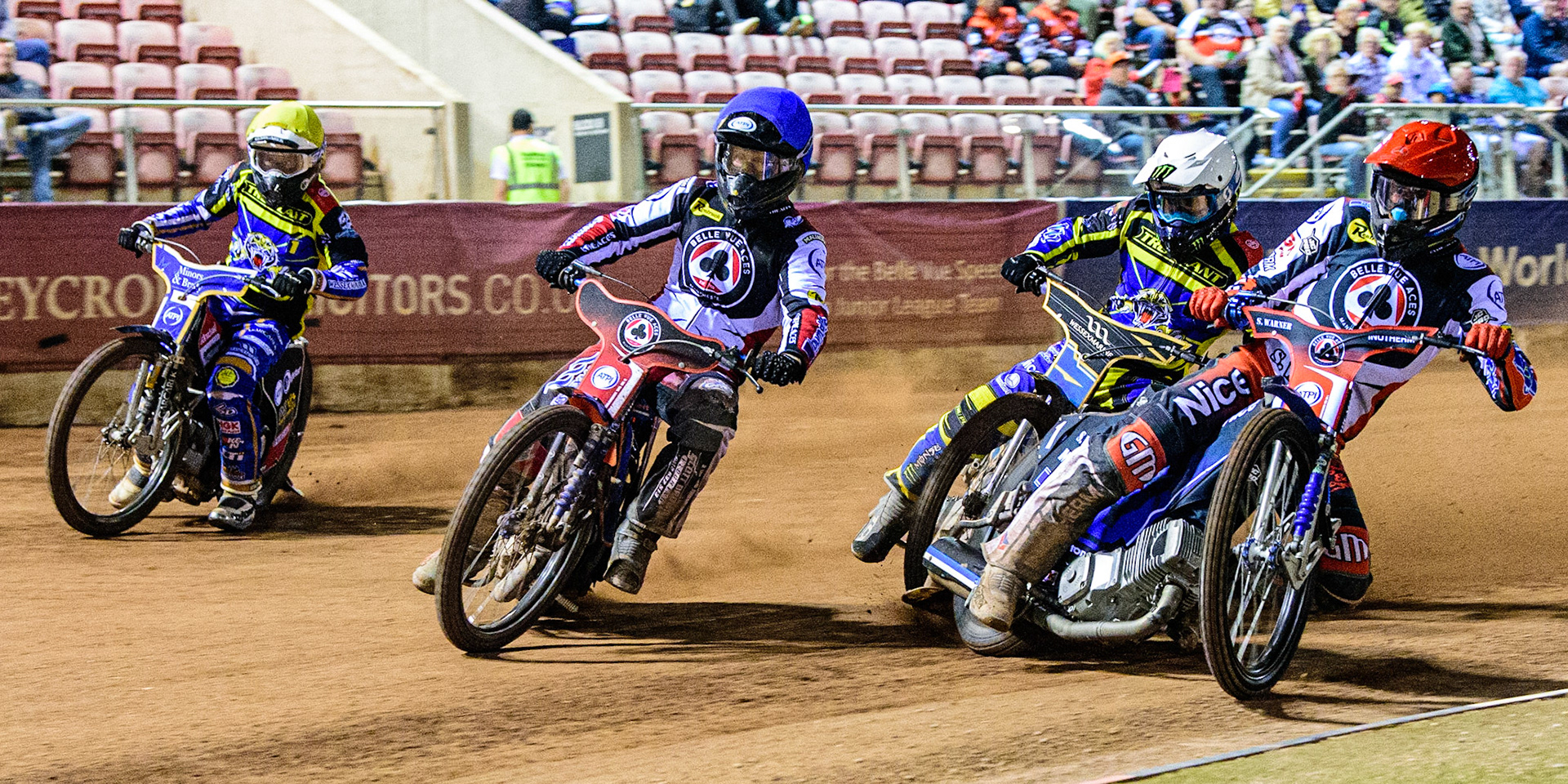 Matej Zagar  (Red) and Brady Kurtz  (Blue) lead Jack Holder  (White) and Nikolai Klindt  (Yellow) during the SGB Premiership match between Belle Vue Aces and Sheffield Tigers at the National Speedway Stadium, Manchester on Monday 5th September 2022. (Credit: Ian Charles | MI News)