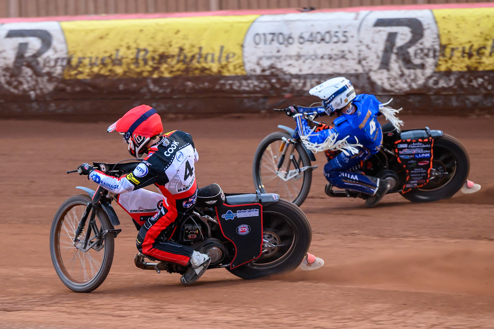 Zach Cook of Belle Vue Aces in Red rides inside Cooper Rushen of Kings Lynn Stars in White  during the Rowe Motor Oil Premiership match between Belle Vue Aces and King's Lynn Stars at the National Speedway Stadium, Manchester on Monday 29th June 2026. (Photo: Ian Charles | MI News)