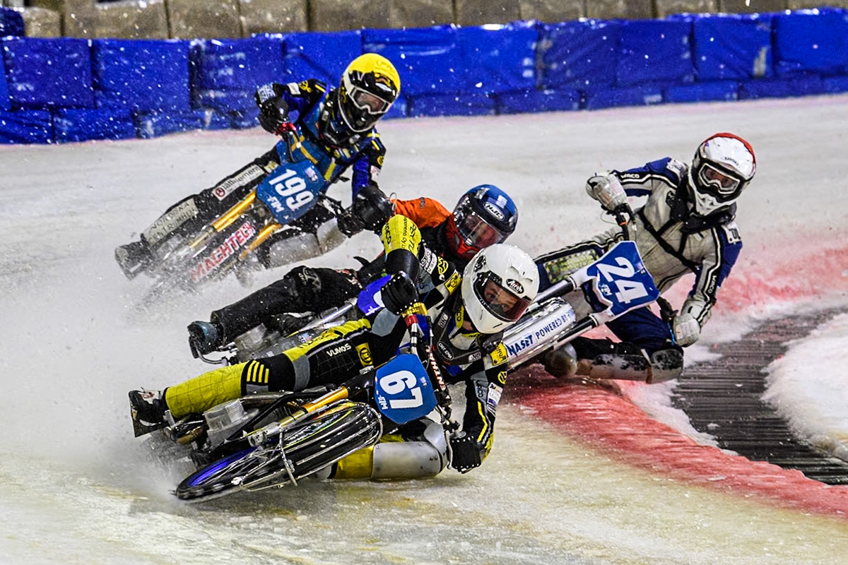 Finland's Heikki Huusko (67) in White leading Finland's Aki Ala-Riihimäki (66) in Blue Finland's Max Koivula (24) in Red and Sweden's Martin Haarahiltunen (199)  in Yellow during the FIM Ice Speedway Gladiators World Championship Final 3 at Ice Rink Thialf, Heerenveen on Saturday 6th April 2024. (Photo: Ian Charles | MI News)