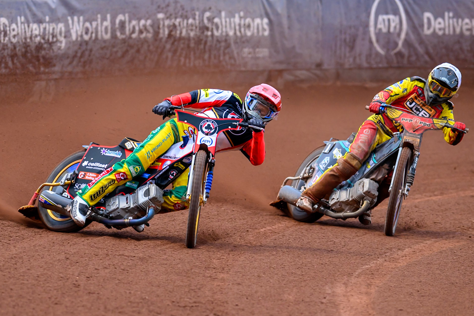 Jason Doyle of Belle Vue Aces in Red leading Ryan Douglas of Leicester Lions in White during the Rowe Motor Oil Premiership match between Belle Vue Aces and Leicester Lions at the National Speedway Stadium, Manchester on Monday 15th June 2026. (Photo: Ian Charles | MI News)
